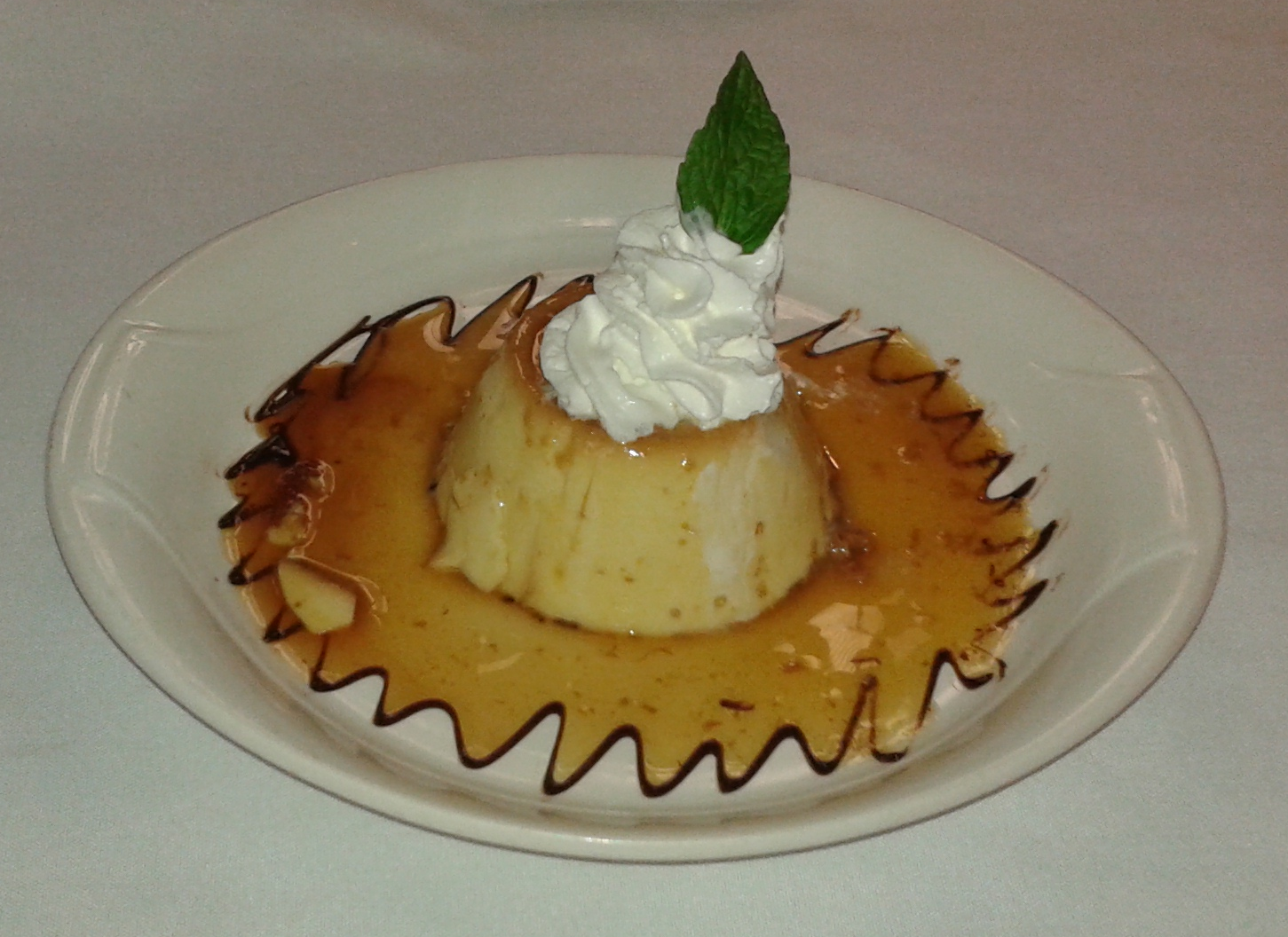 Order Homemade flan food online from Mijares Mexican Restaurant store, Pasadena on bringmethat.com