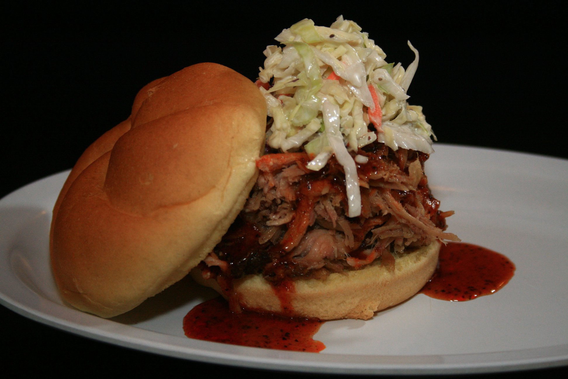 Order PULLED PORK SANDWICH food online from Kloby's Smokehouse store, Laurel on bringmethat.com