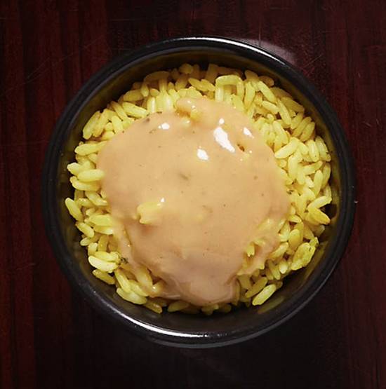Order Yellow Rice - Medium food online from Oohh & Aahh store, Washington on bringmethat.com