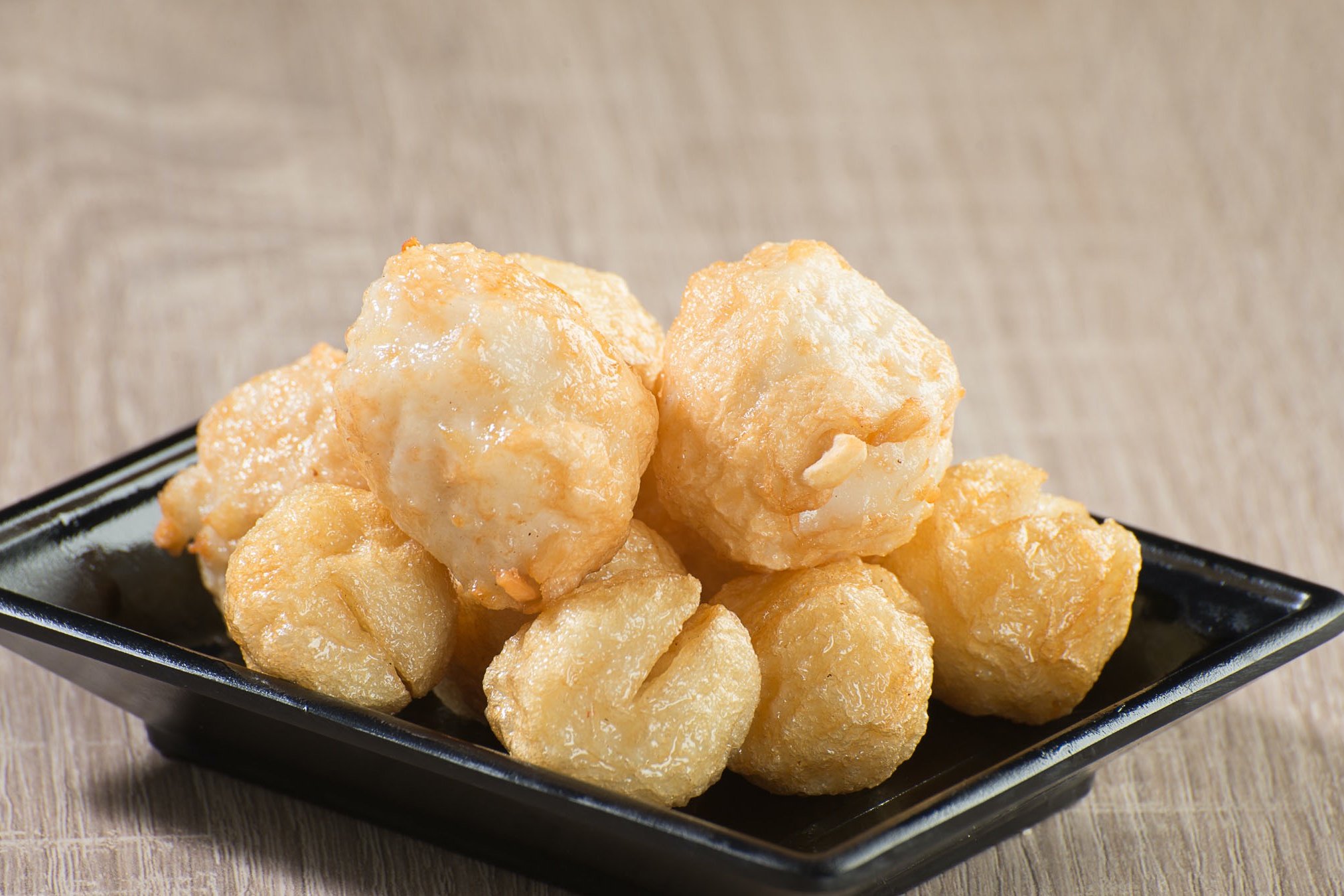 Order A12 Fried Squid Ball 炸花枝丸* food online from Chicken dijon store, Los Angeles on bringmethat.com