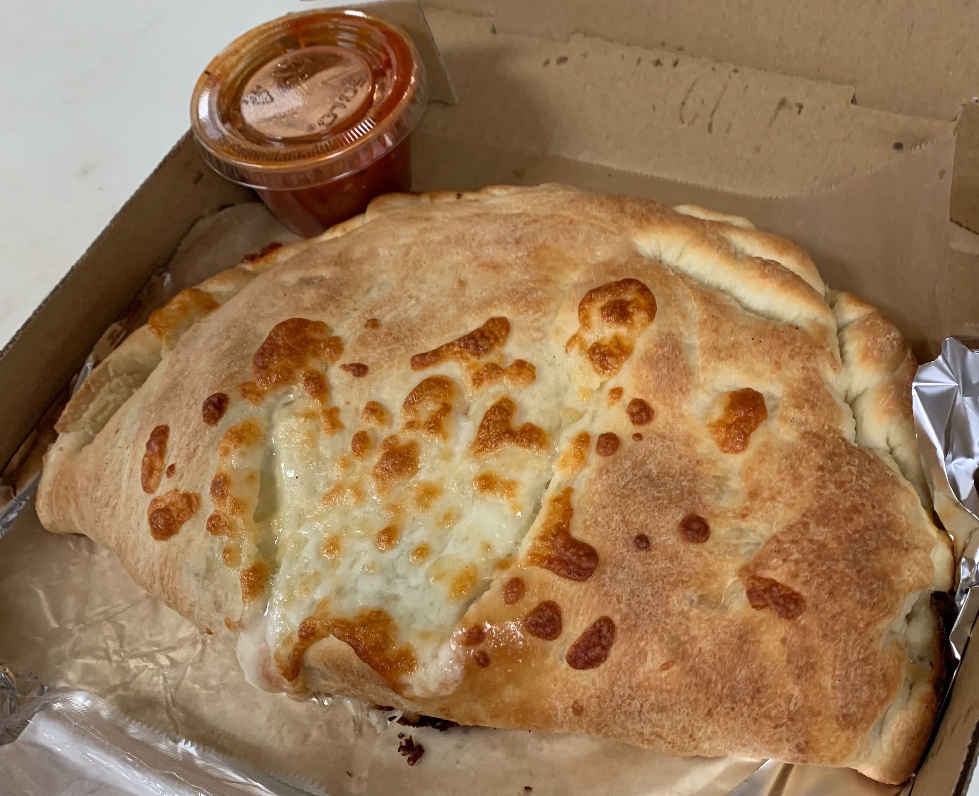 Order Sausage Calzone food online from Boston Pizza store, Las Vegas on bringmethat.com