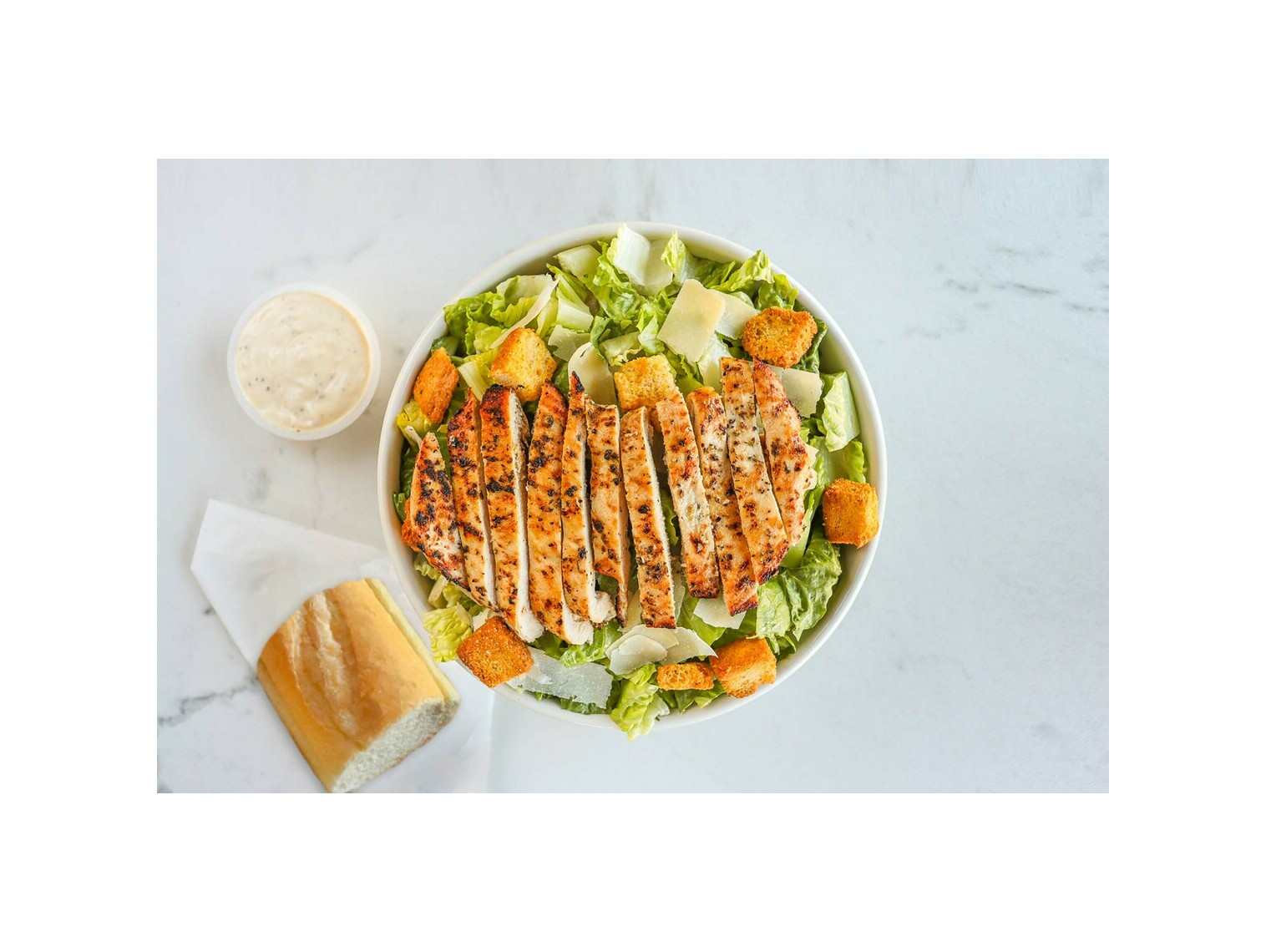 Order Classic Char-Grilled Chicken Caesar Salad food online from Buona store, Berwyn on bringmethat.com
