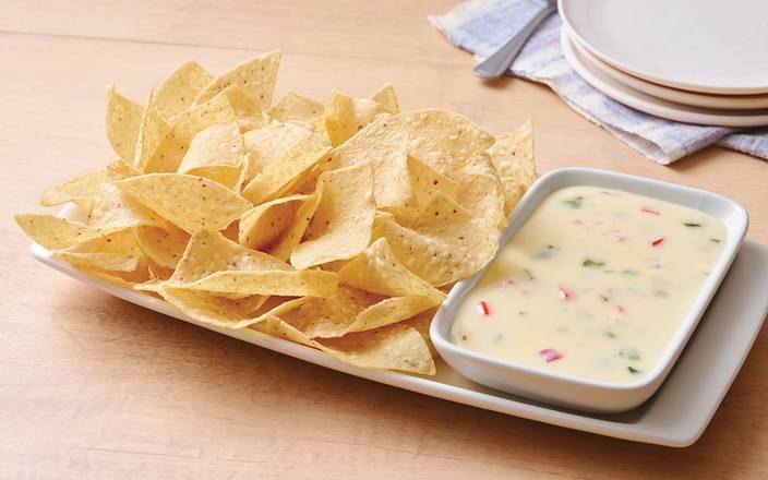 Order White Queso Dip & Chips food online from Applebee store, Calexico on bringmethat.com