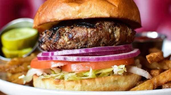 Order The Society Burger food online from The League Kitchen & Tavern store, Austin on bringmethat.com