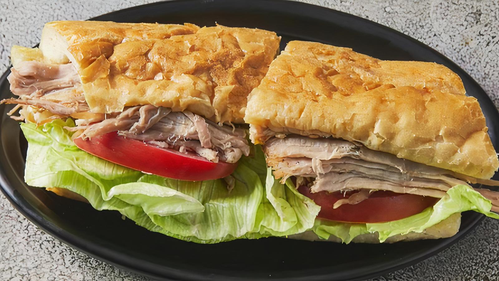 Order Sandwich de Lechón food online from Ponce Resturant store, Chicago on bringmethat.com