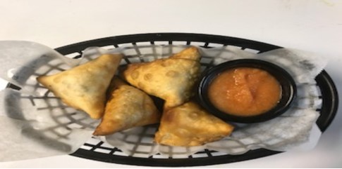 Order 4 Piece Lamb Samosas food online from African Grill And Bar store, Denver on bringmethat.com