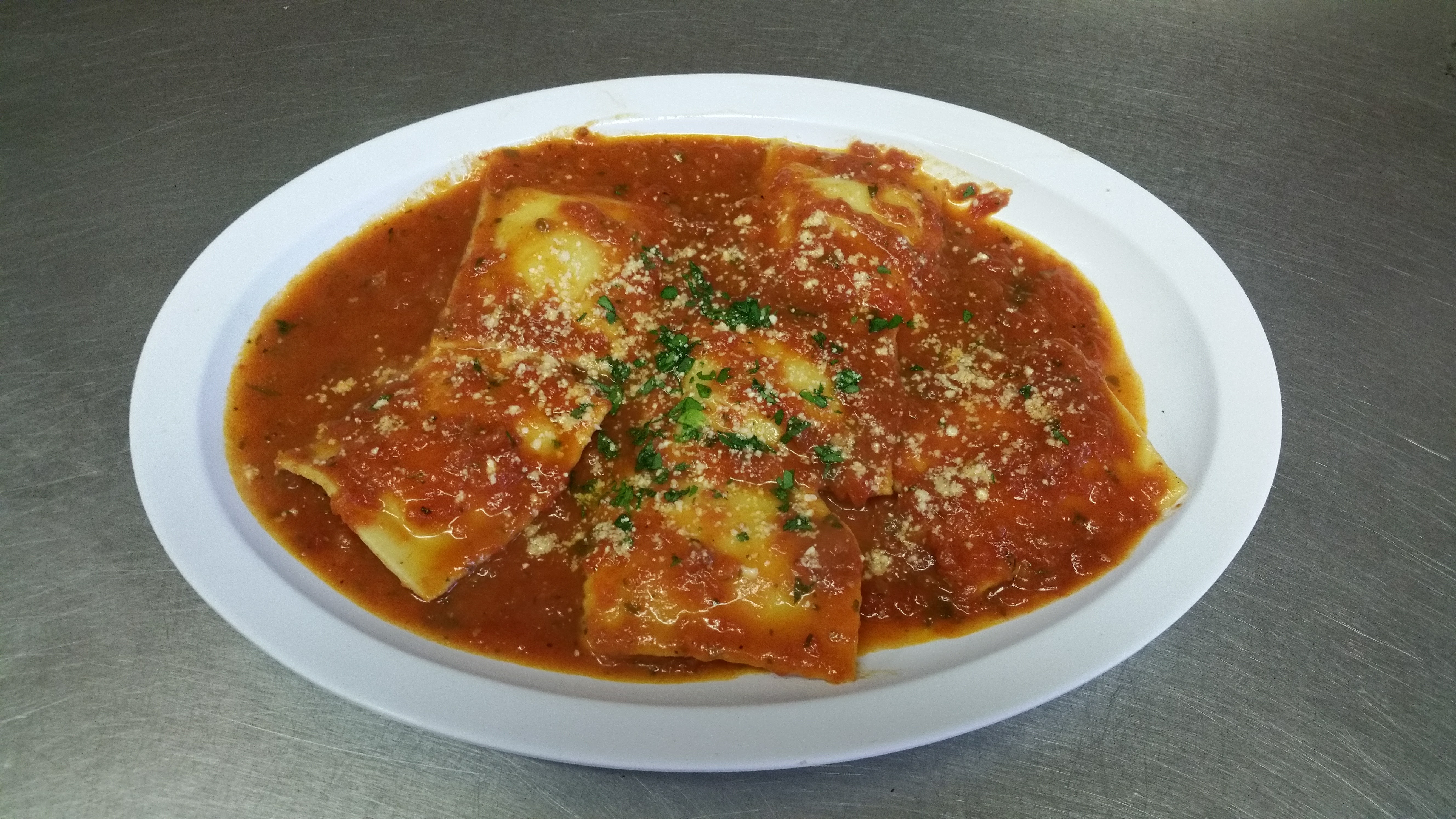 Order Ravioli food online from Pizzarelli's Pizza store, Scarsdale on bringmethat.com