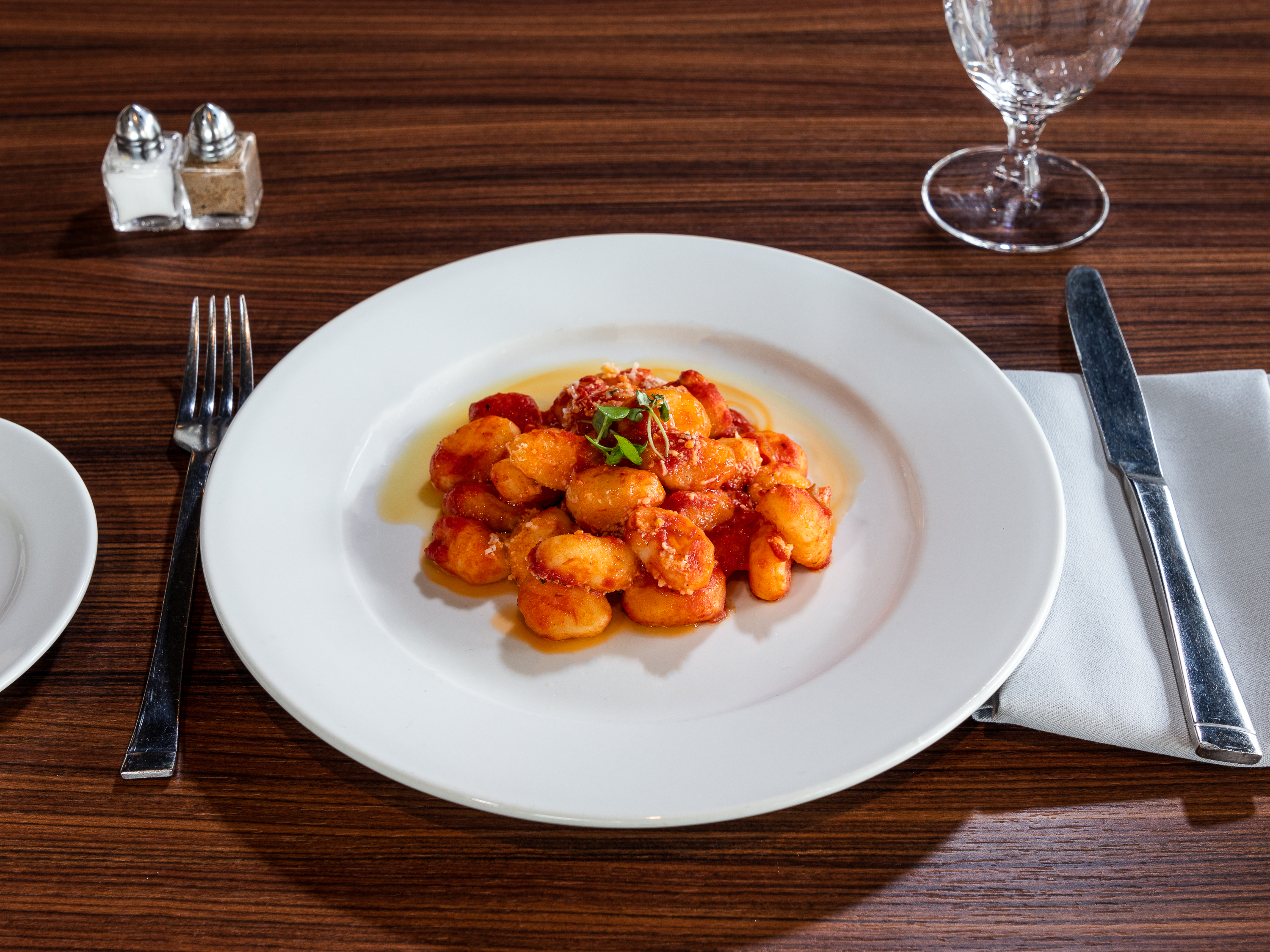 Order Gnocchi with Signature Tomato Sauce food online from Loveria Caffe store, Colleyville on bringmethat.com