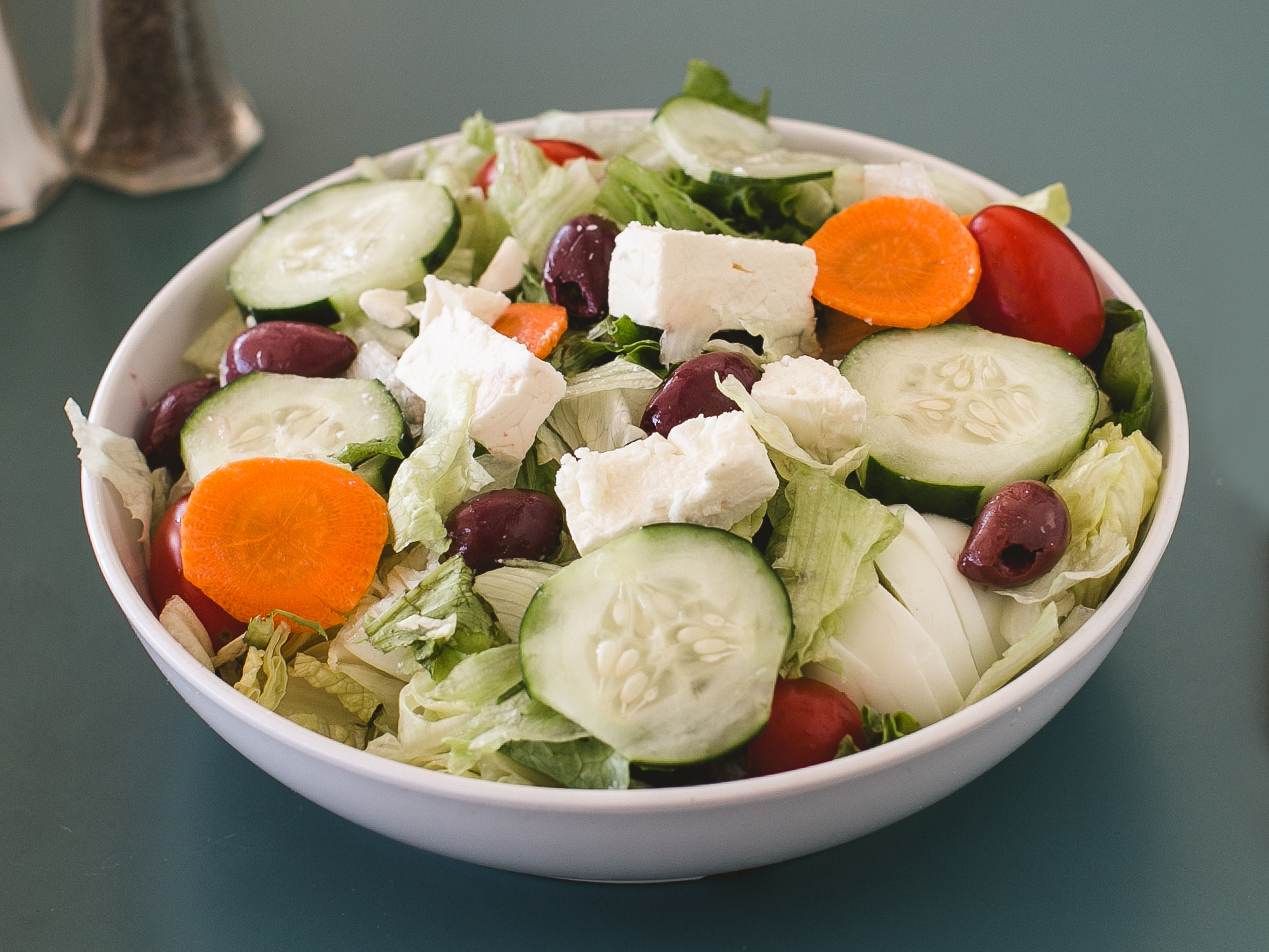 Order Greek Salad food online from Kosmos Pizza store, Norristown on bringmethat.com