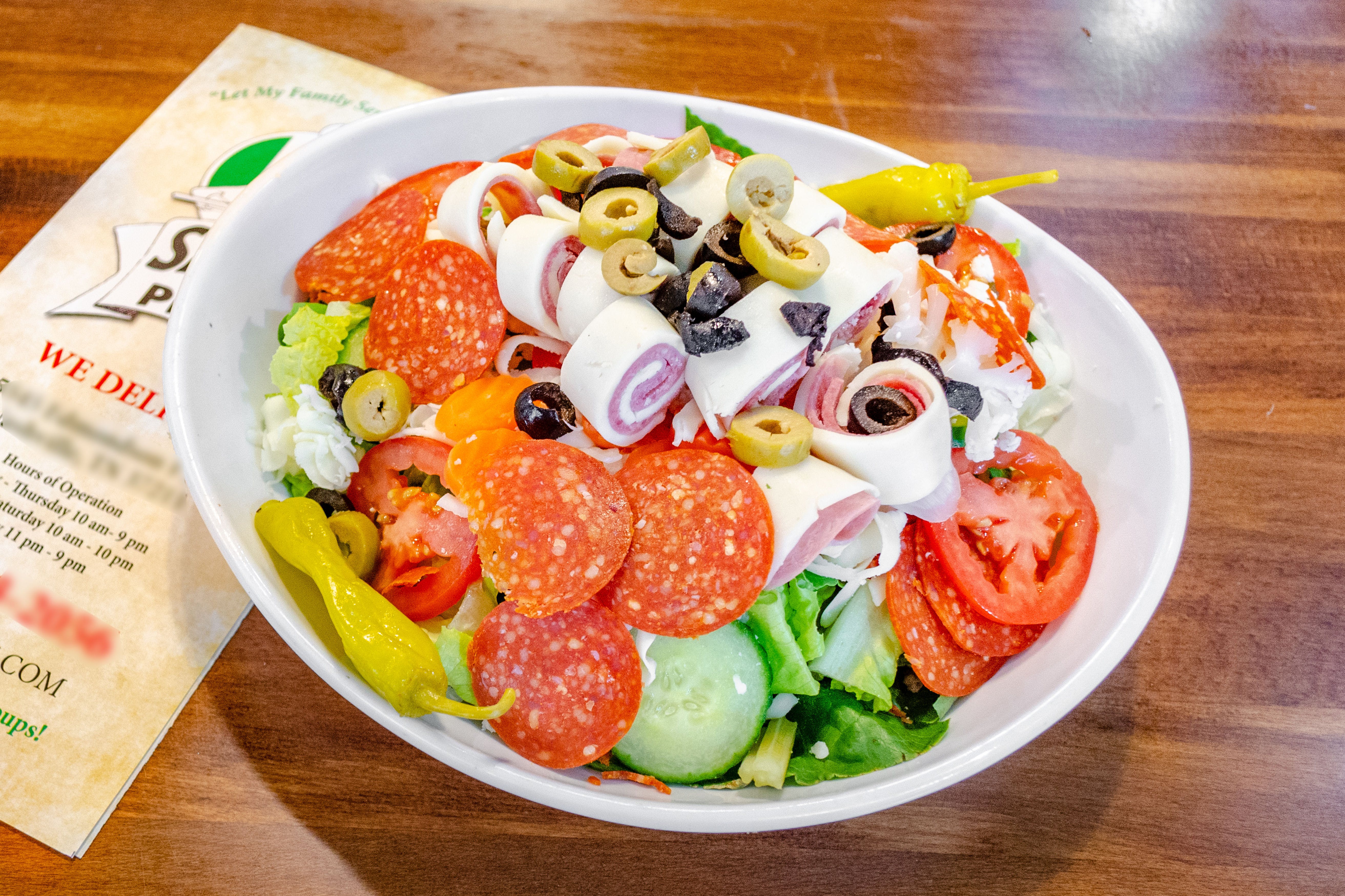 Order Antipasto Salad - Salad food online from Sals Family Pizza store, Nashville on bringmethat.com