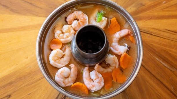 Order 10. Tom Yum Hot and Sour Lemongrass Soup food online from Peppers Thai Cuisine store, Palm Desert on bringmethat.com