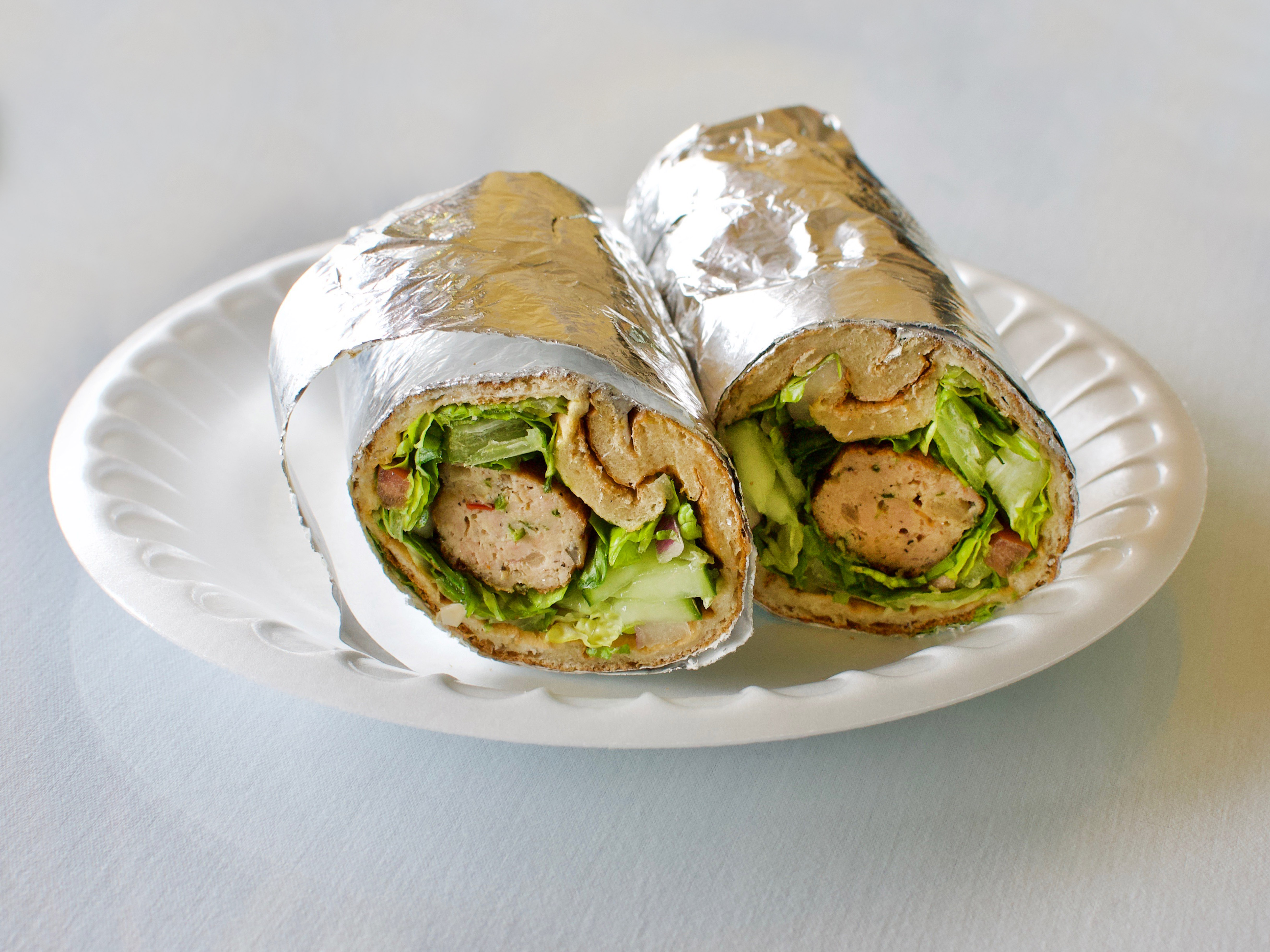 Order Naan Kabob Roll [chicken] food online from Mughal Oasis Restaurant store, Springfield on bringmethat.com