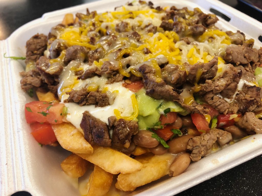 Order Meat Fries food online from The City Taqueria store, San Francisco on bringmethat.com