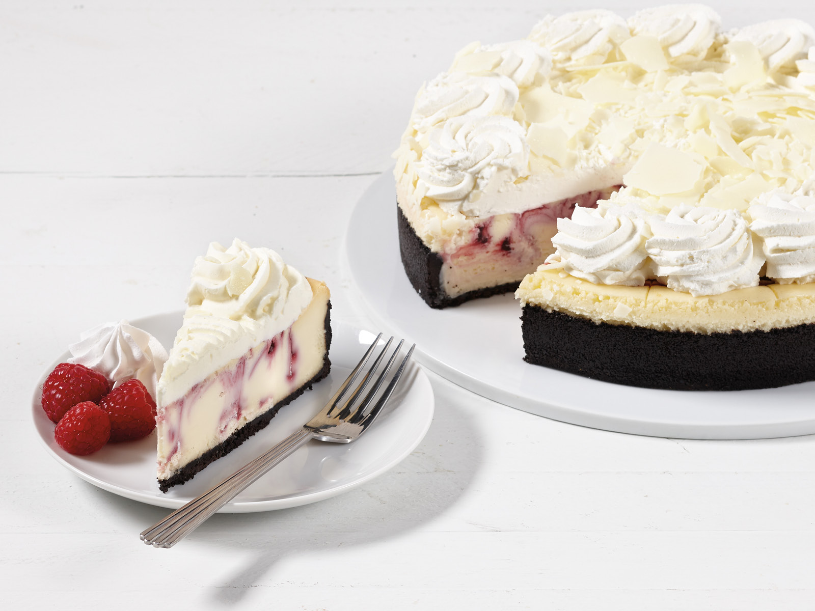 Order White Chocolate Raspberry Cheesecake food online from Hy-Vee Mealtime store, Moline on bringmethat.com