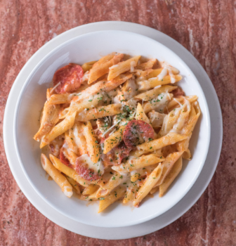 Order Baked Penne Special food online from Caffe Capri store, Bryan on bringmethat.com