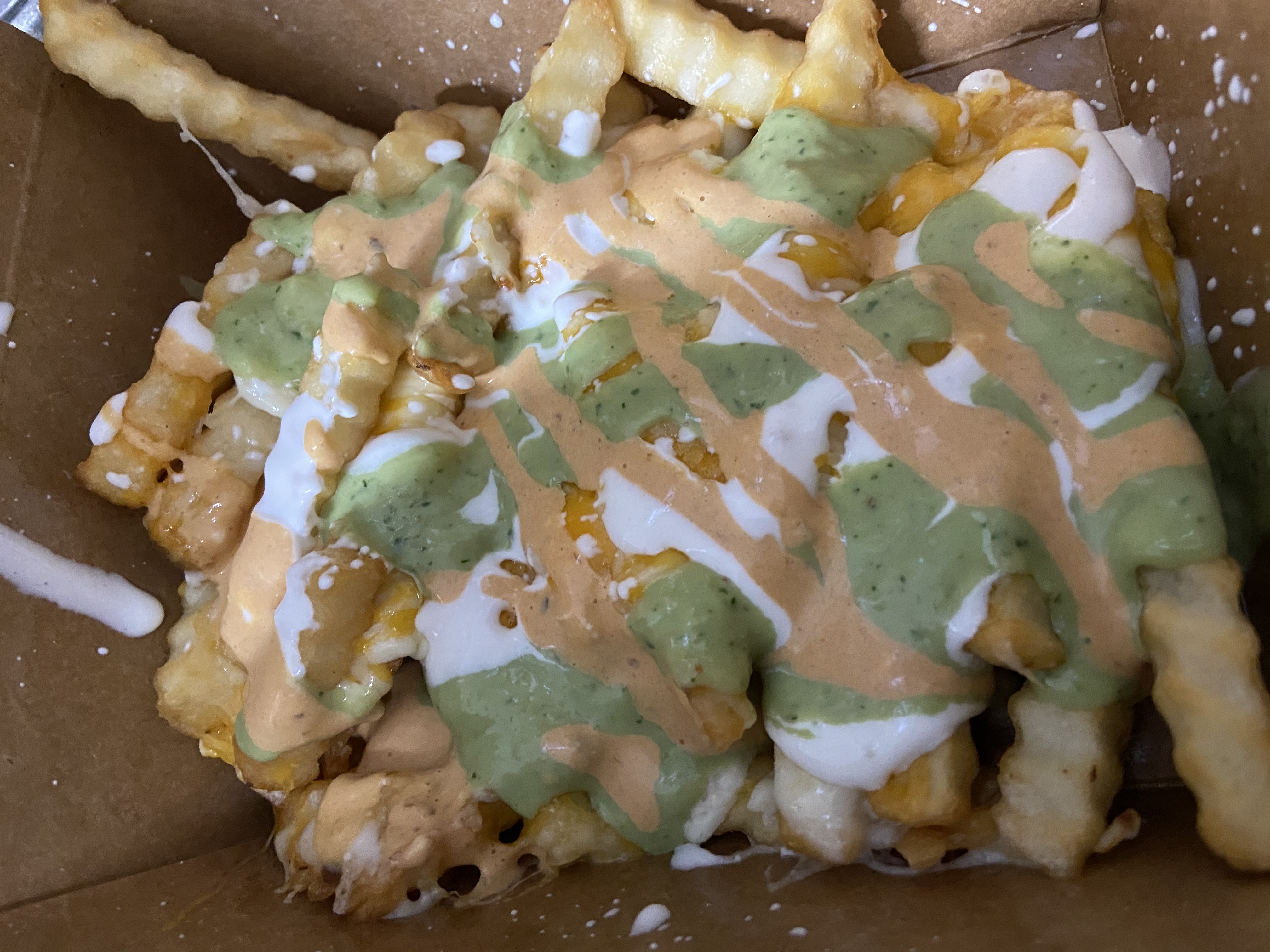 Order LMC Cheese Fries (3 Sauces) food online from Little Mexican Cafe store, New Rochelle on bringmethat.com
