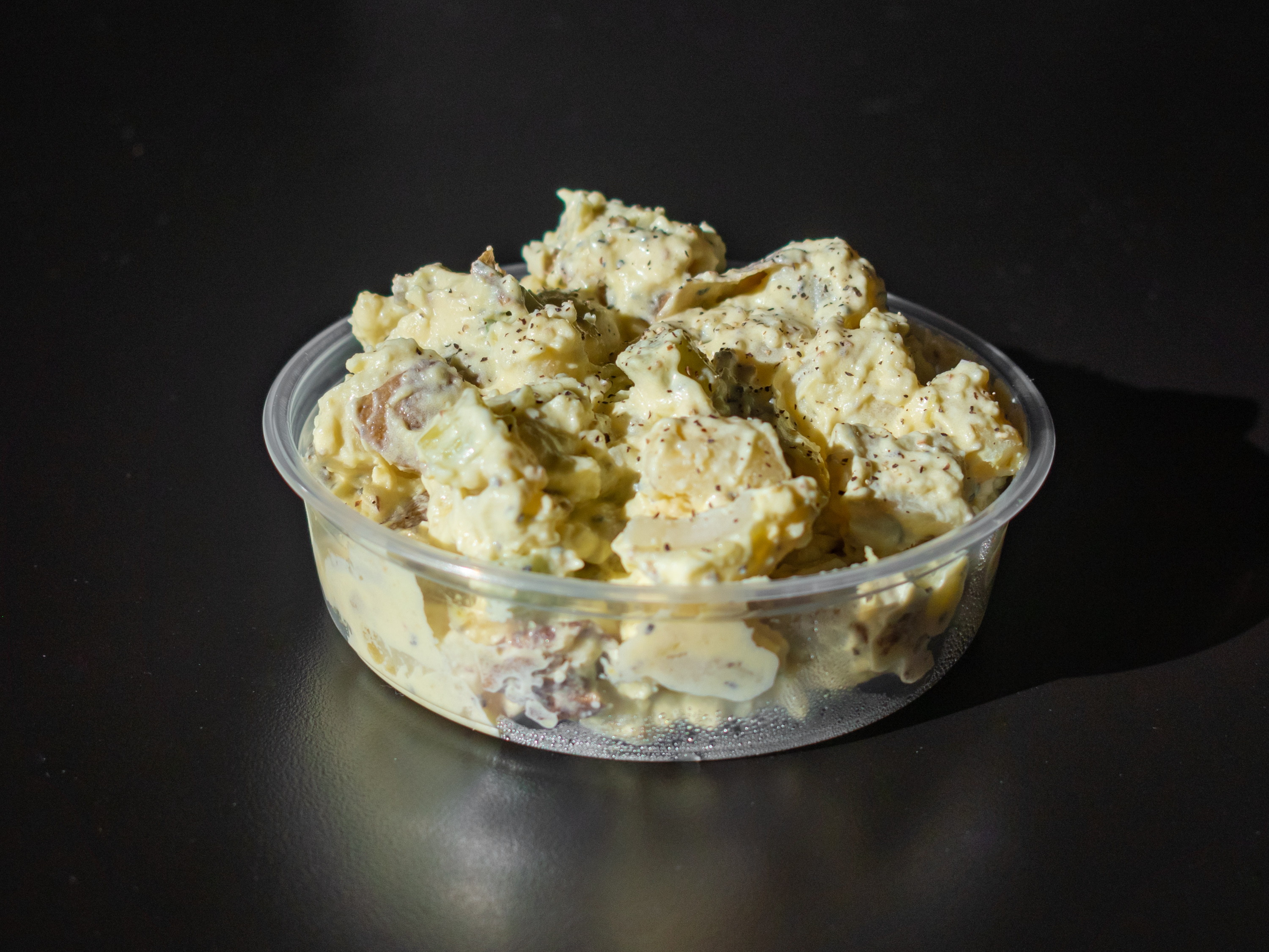 Order Potato Salad- Homemade  food online from The Brown Bag store, Palm Desert on bringmethat.com