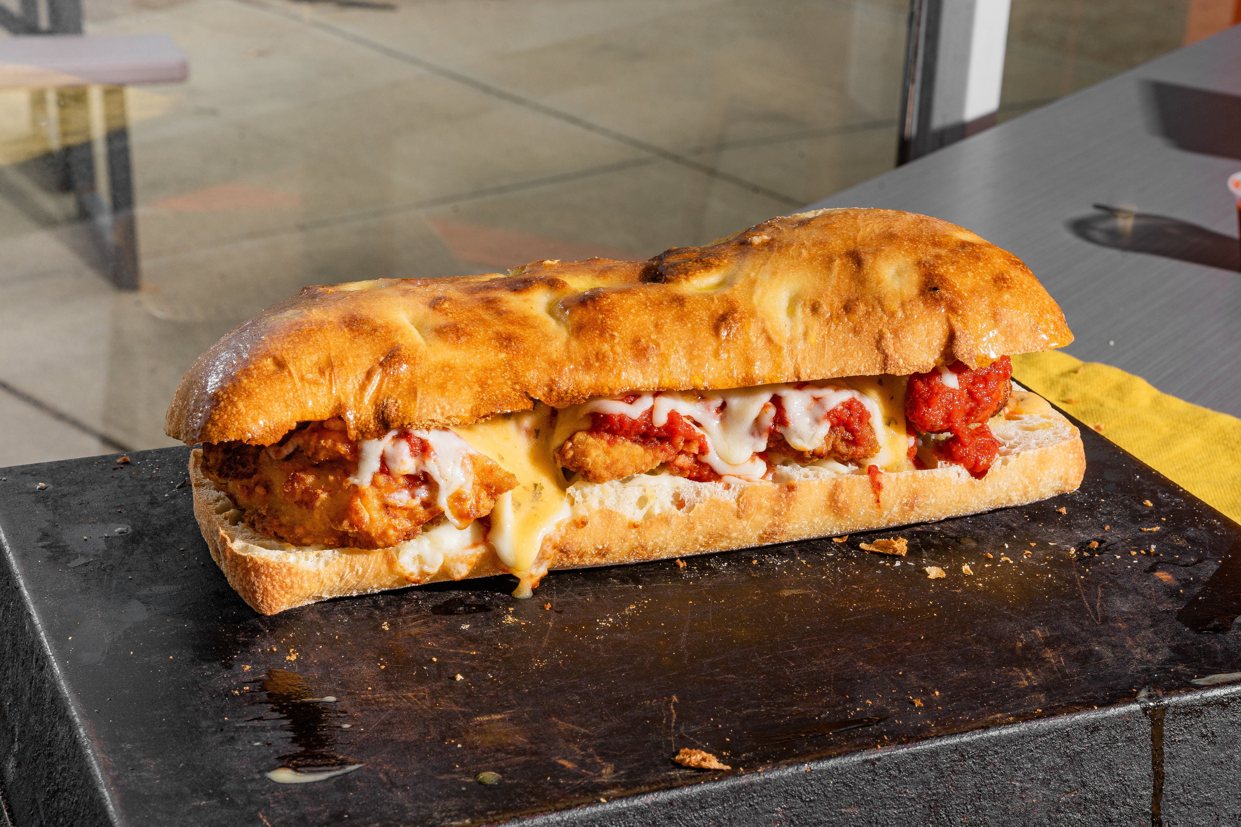 Order Chicken Parmesan Grinder - 10" food online from Cavura Pizza store, North Olmsted on bringmethat.com