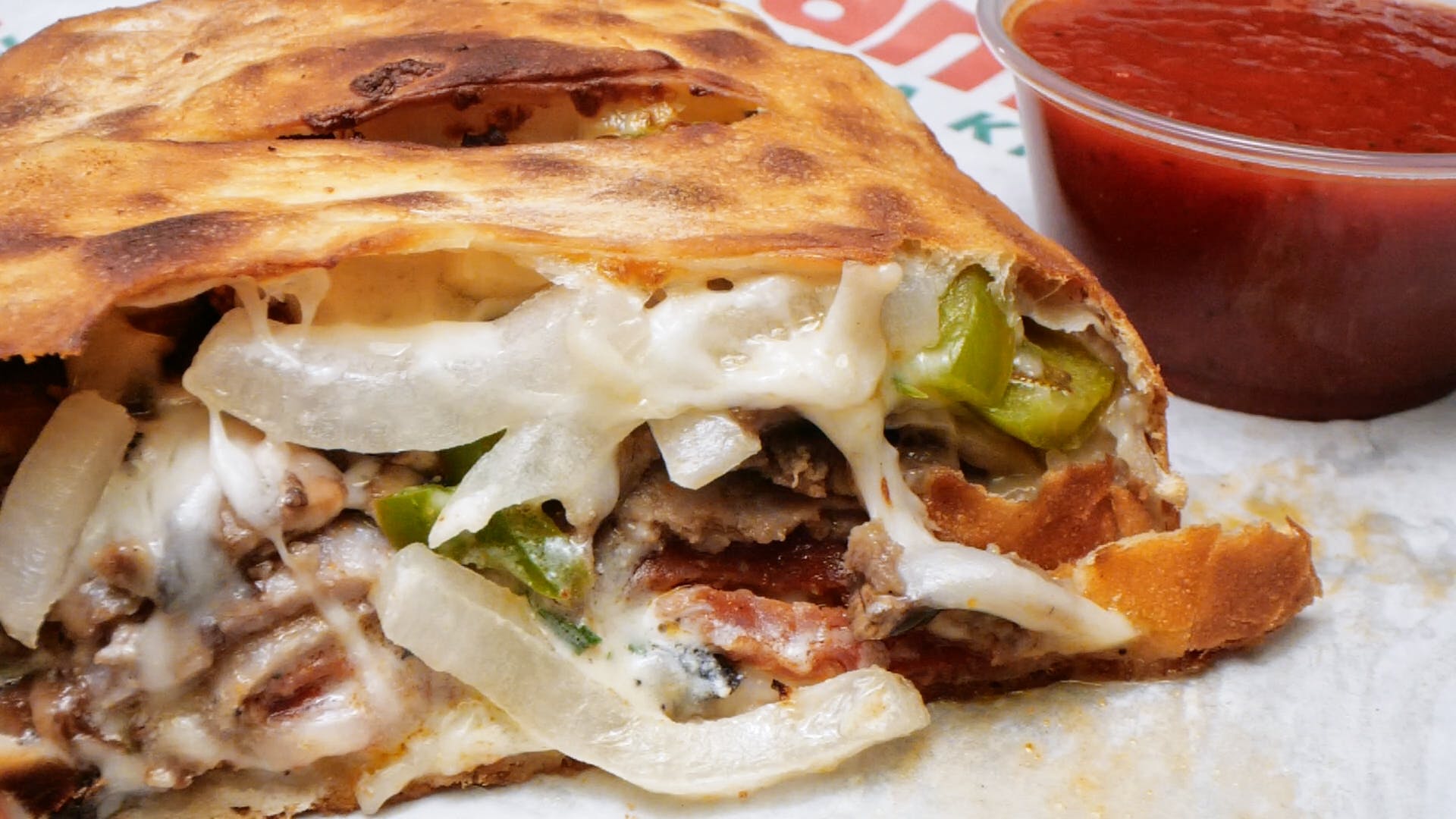 Order Ameci Deluxe Calzone - Calzone food online from Ameci Pizza & Pasta store, Westlake Village on bringmethat.com