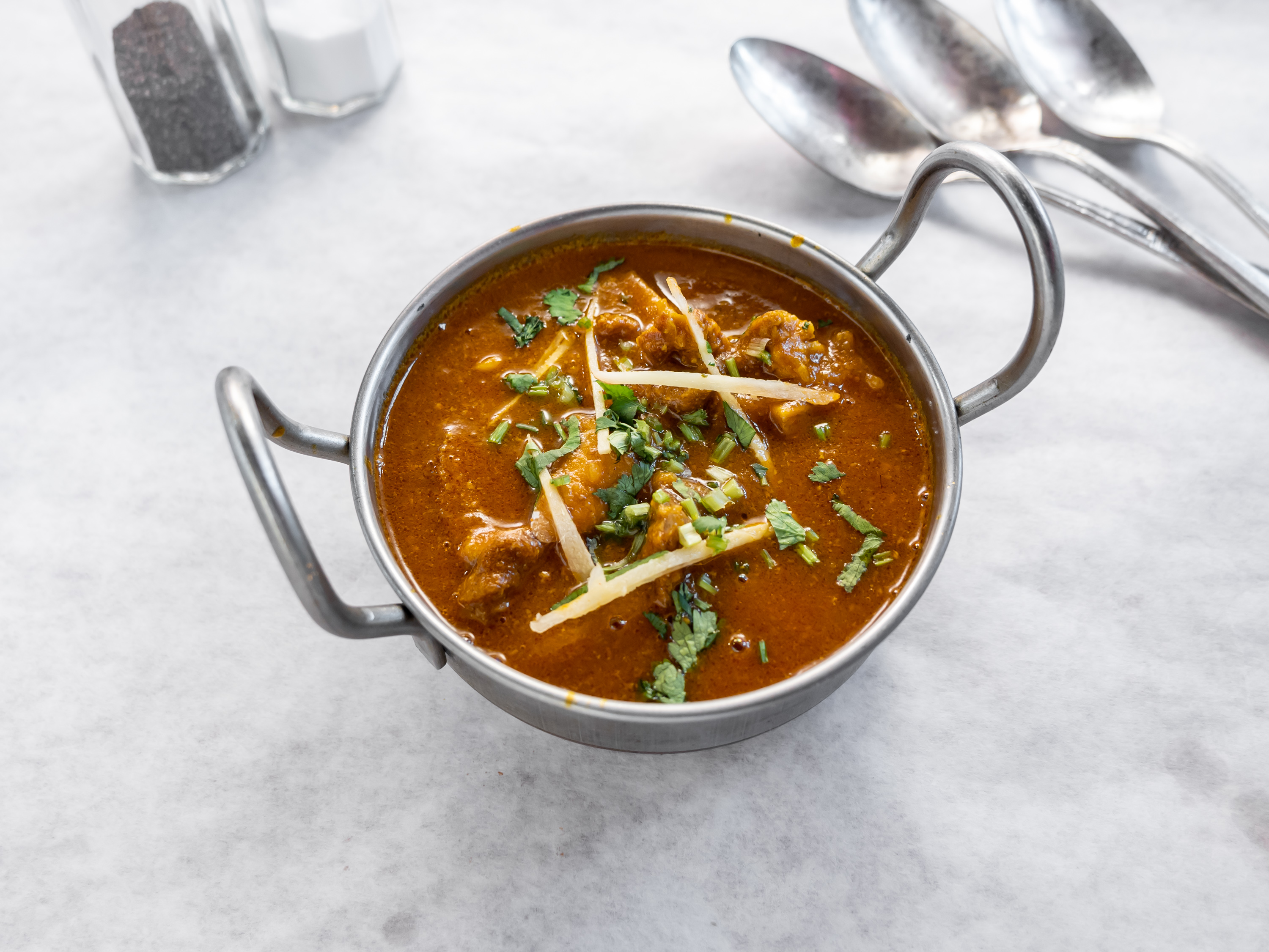 Order Goat Curry food online from Tandoori of India store, Philadelphia on bringmethat.com