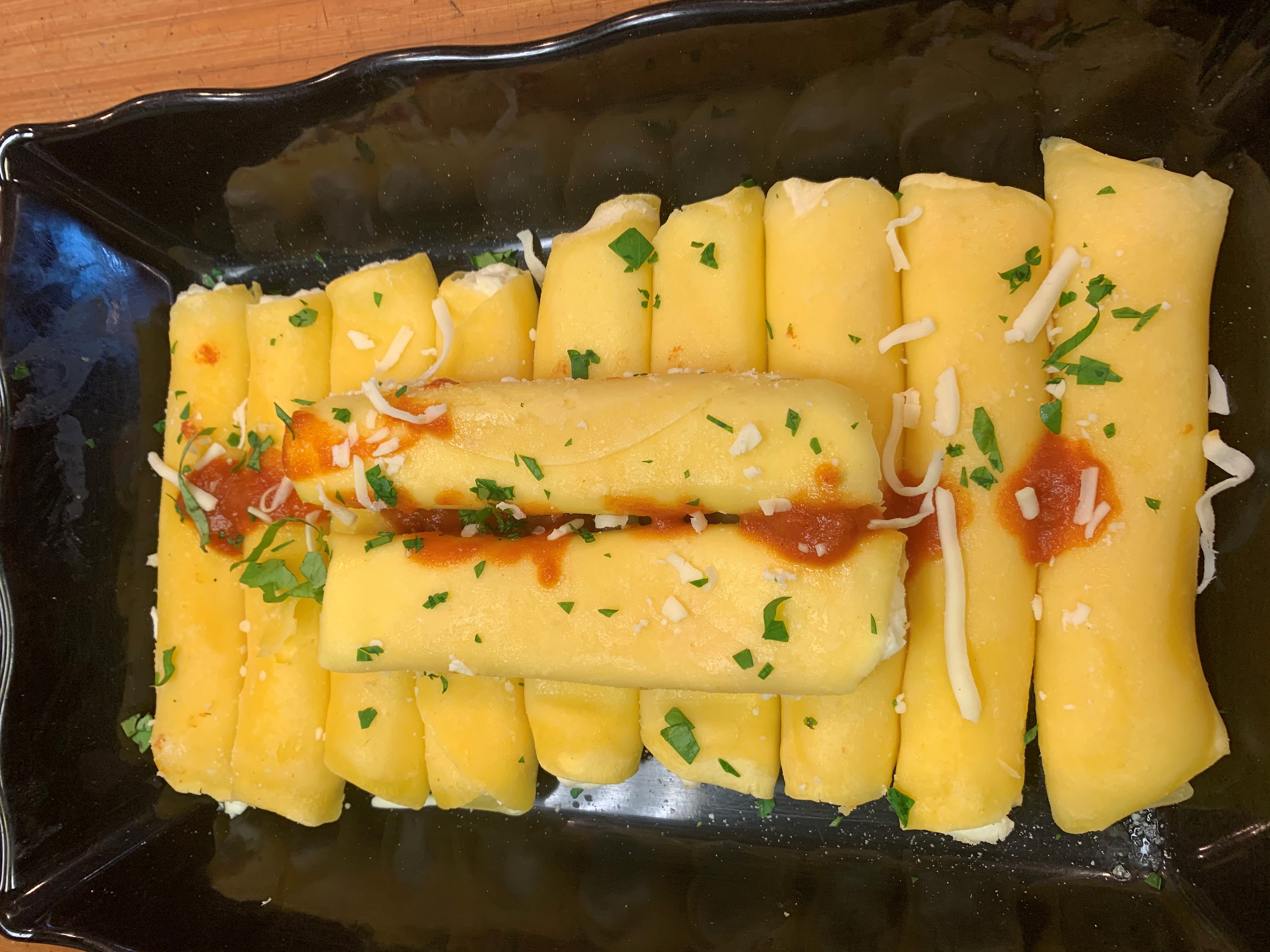 Order 4 Manicotti  food online from Benvenuti Italian Specialties & Catering store, Garwood on bringmethat.com