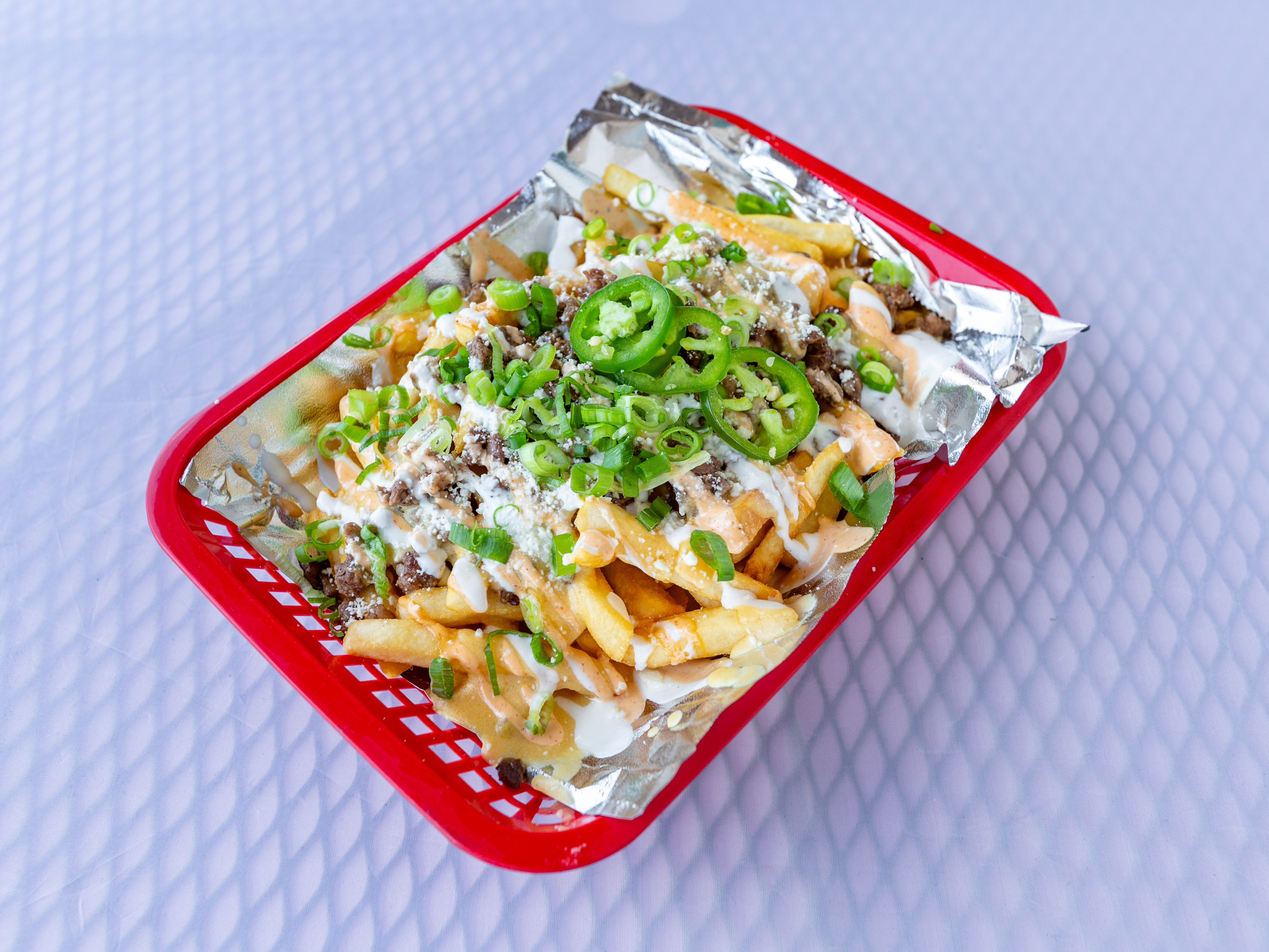 Order Carne Asada Fries food online from Rollies Mexican Patio store, Tucson on bringmethat.com