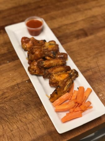 Order 12 Chicken Wings food online from Upland Pizza Company store, Upland on bringmethat.com