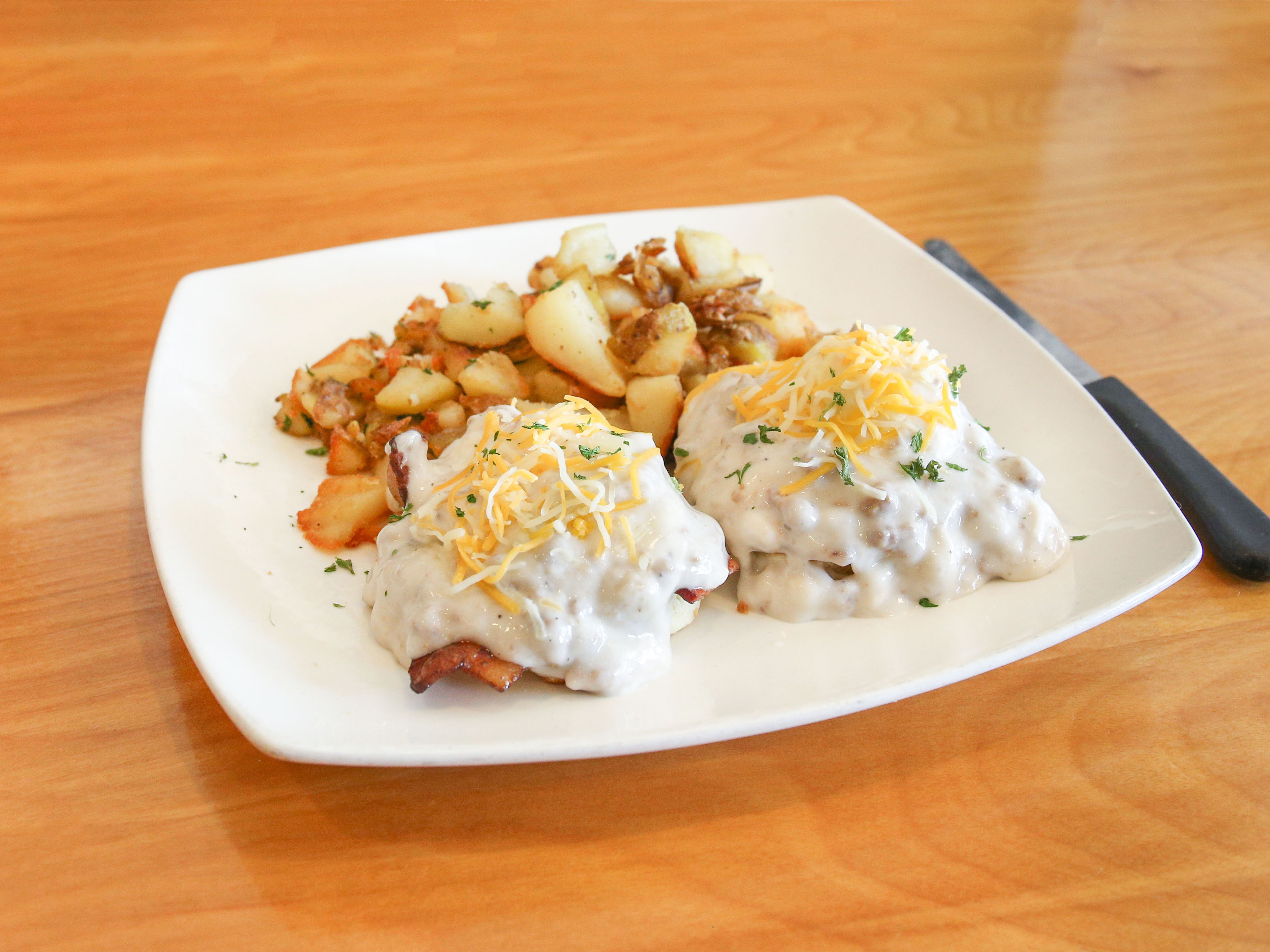 Order Country Biscuit and Gravy Benedict food online from Mikayla's Cafe store, Santa Clara on bringmethat.com