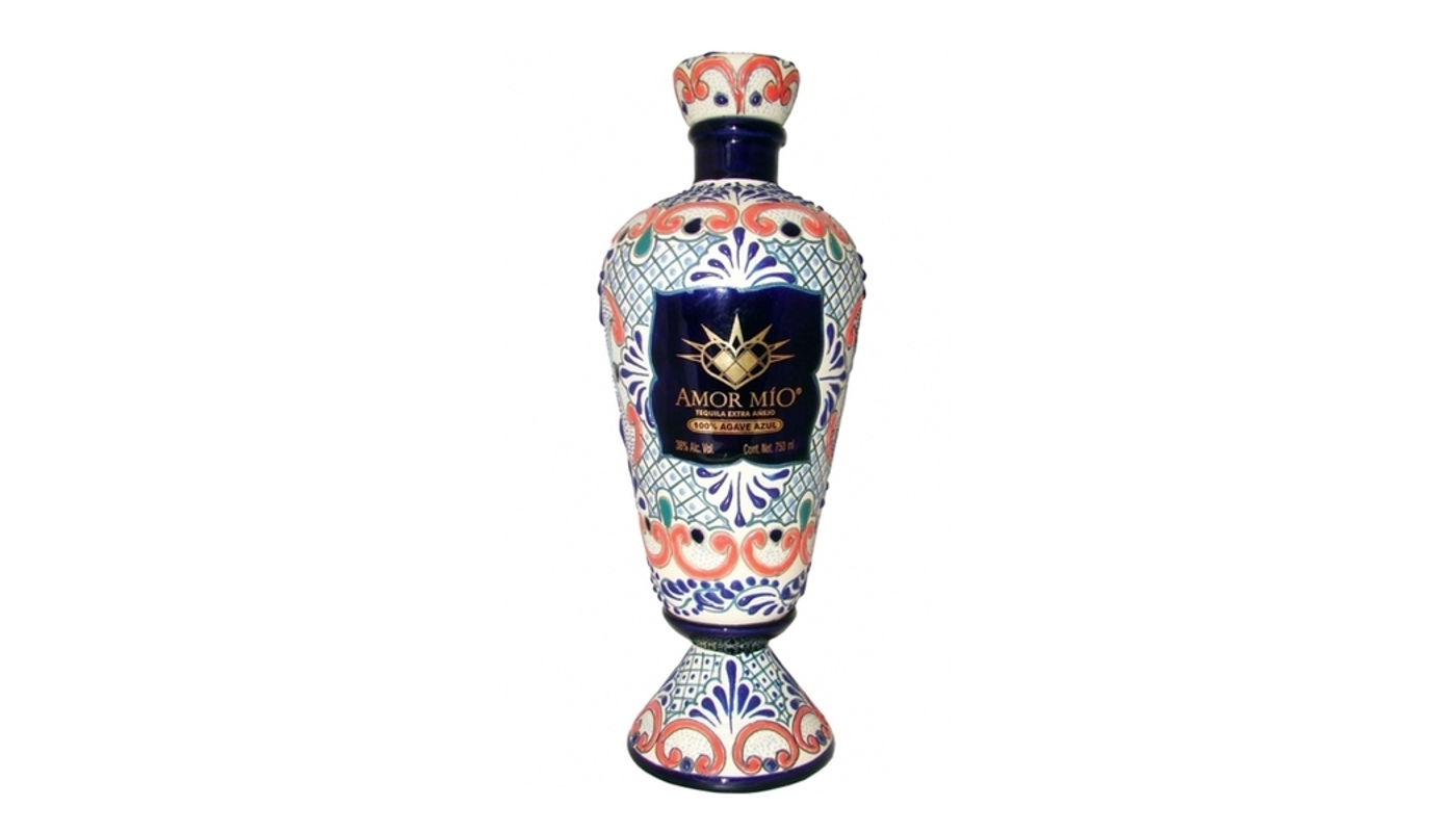 Order Amor Mio Tequila Extra Anejo 750ml Bottle food online from Circus Liquor store, Los Angeles on bringmethat.com