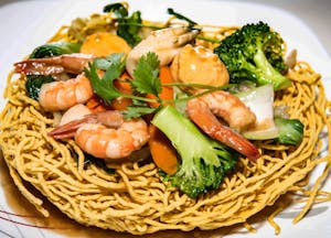 Order B5. Pan Fried Seafood Noodles - Mi Xao Don food online from Cyclo Vietnamese Cuisine store, Chandler on bringmethat.com