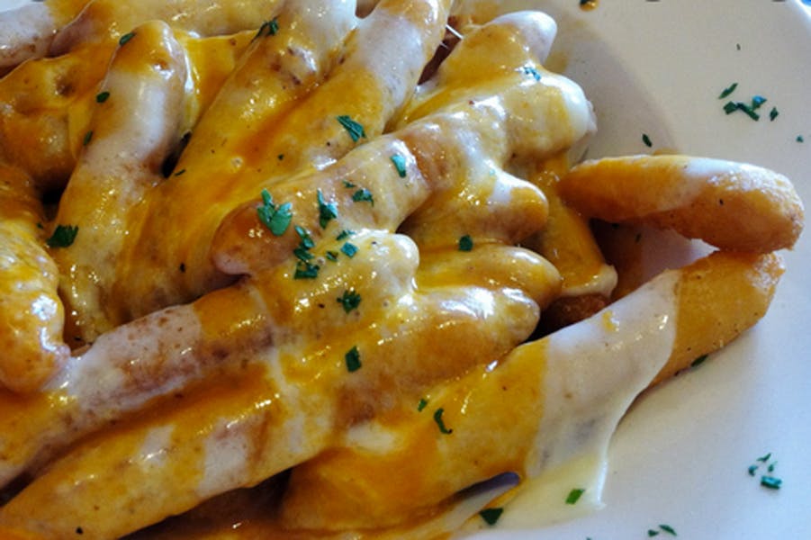 Order Disco Fries with Gravy & Mozzarella - Appetizer food online from Brother Bruno Pizza store, Washingtonville on bringmethat.com
