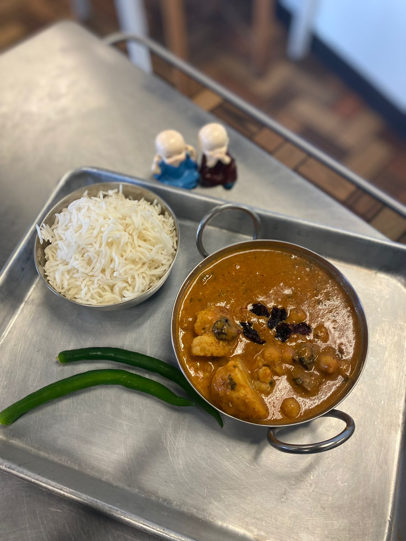 Order Raja’s Pasanda Curry food online from 7 Monks Café store, New Braunfels on bringmethat.com