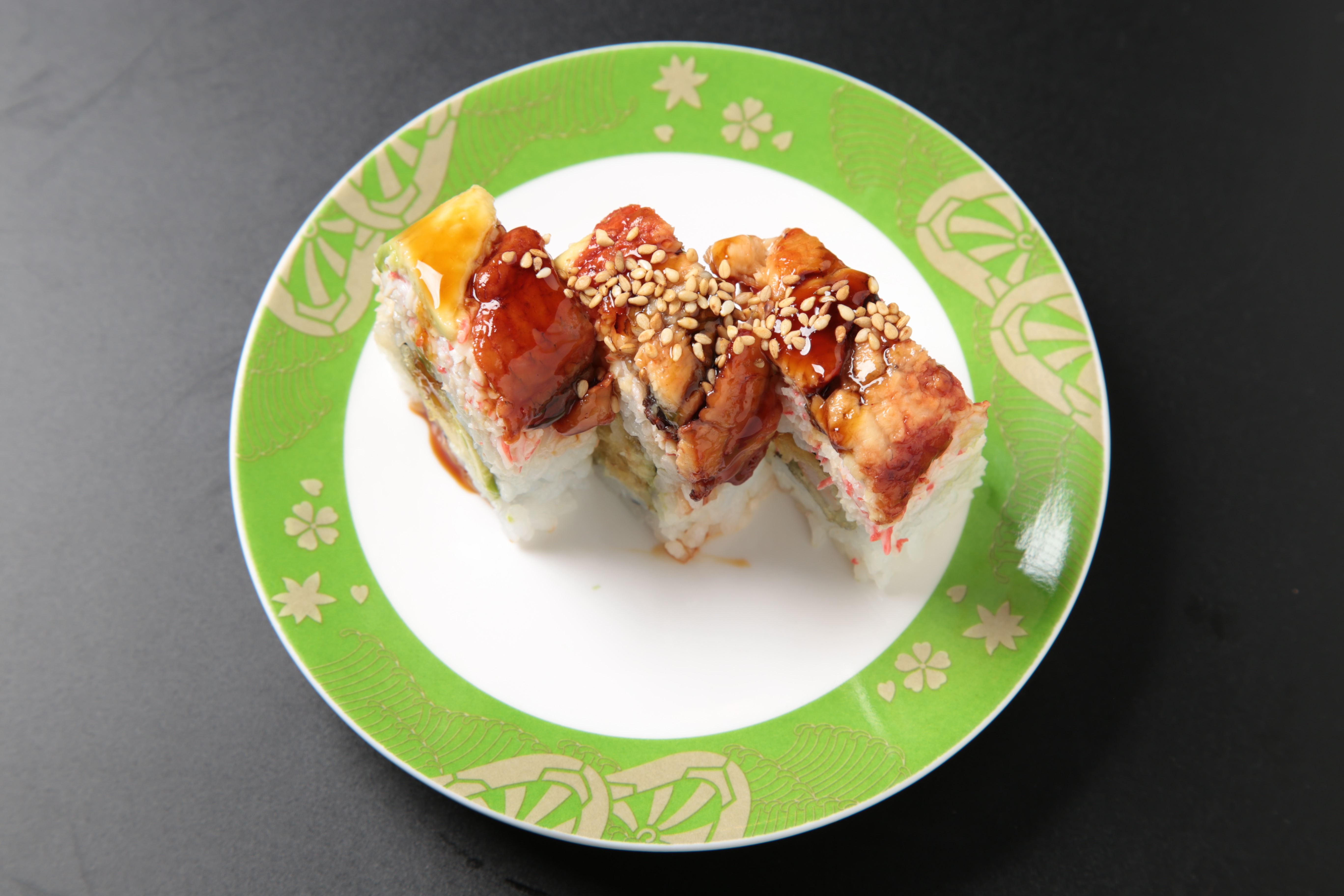 Order Dragon Roll (9 pcs) food online from Izumi Revolving Sushi store, Daly City on bringmethat.com