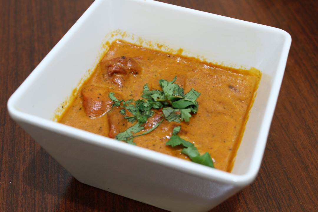 Order Butter Chicken food online from New Tandoori Cafe store, San Jose on bringmethat.com