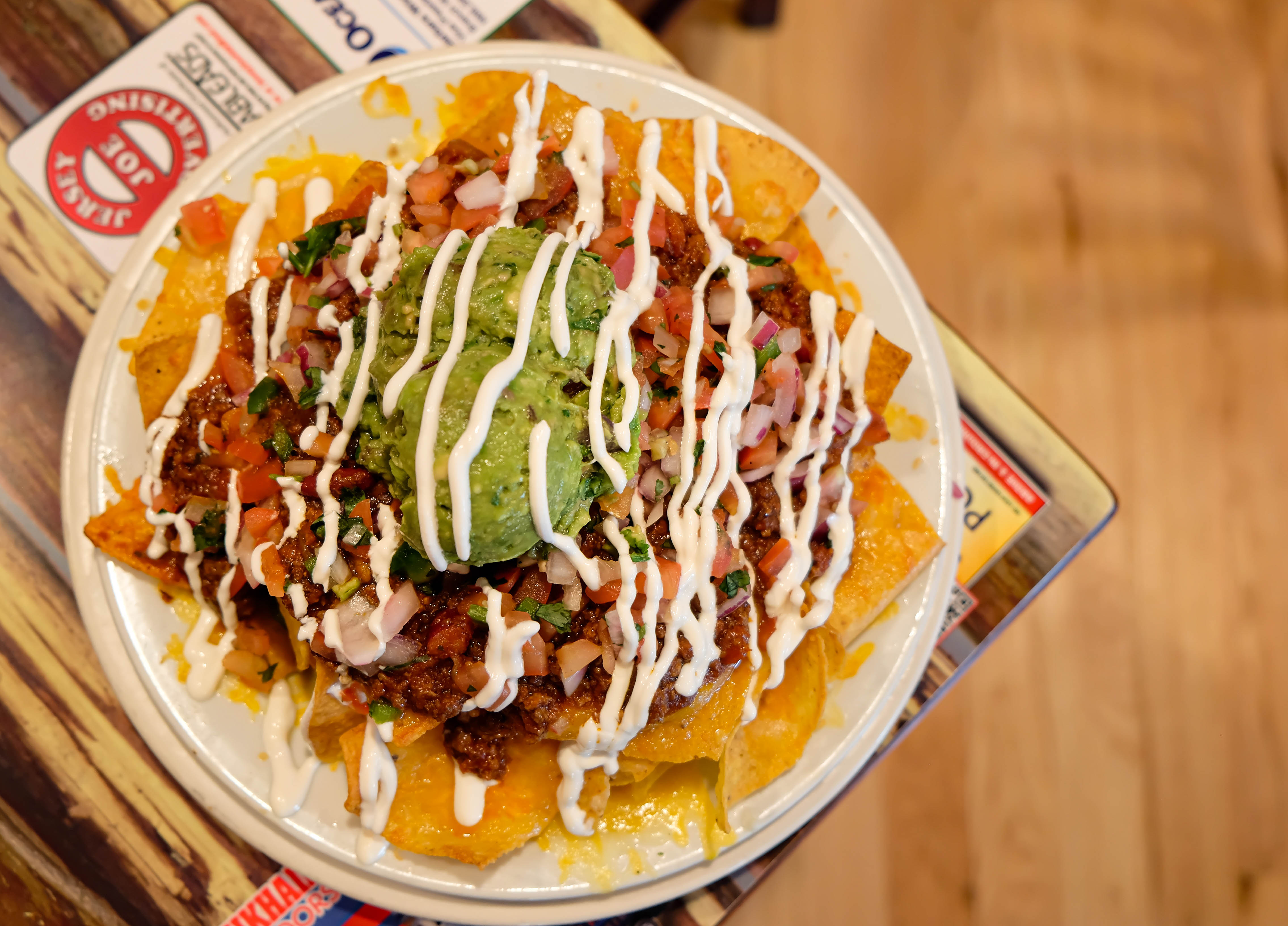 Order Loaded Nachos food online from The Cabin Restaurant store, Freehold on bringmethat.com