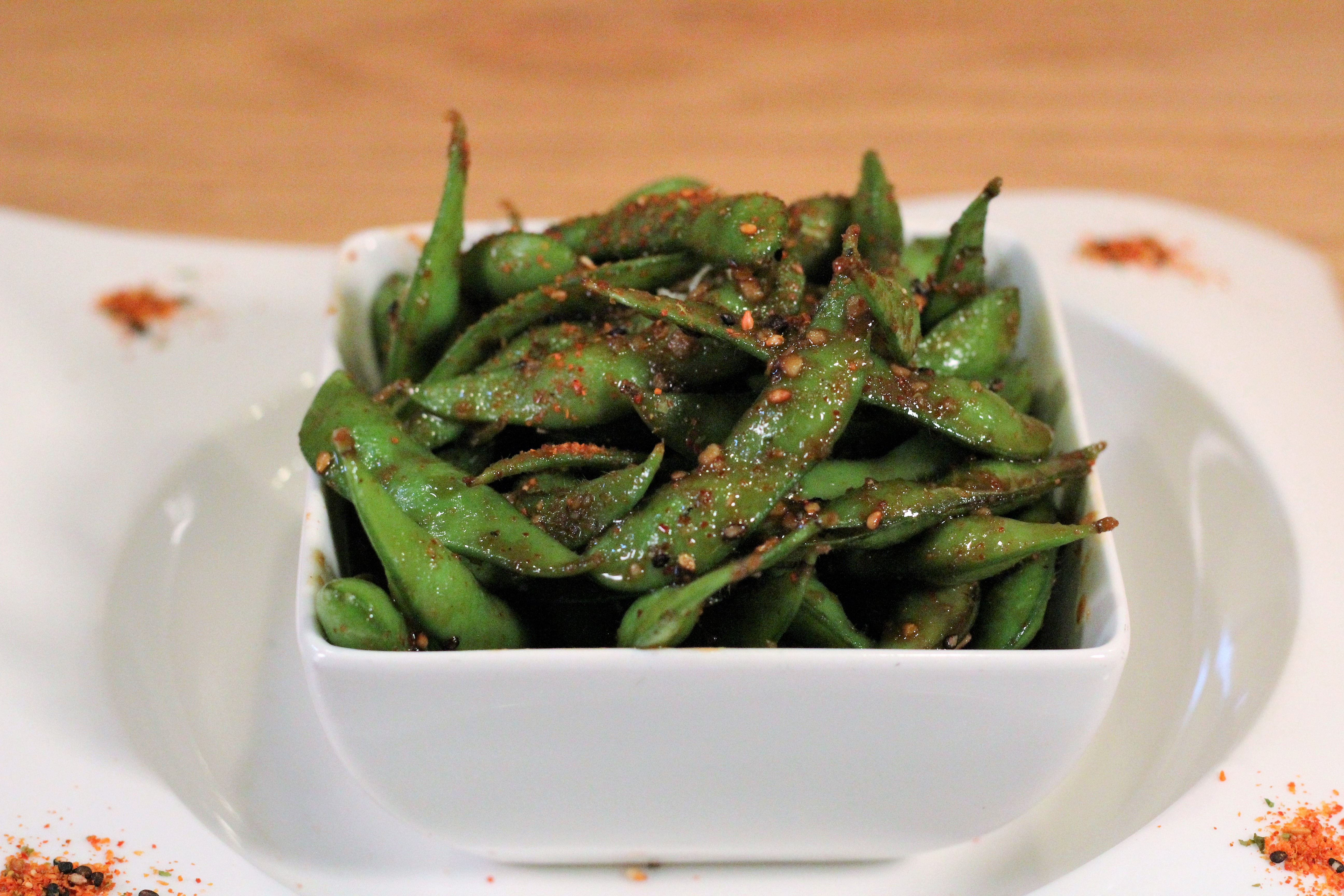Order Spicy Garlic Edamame food online from Yoshi Ramen And Sushi store, Daly City on bringmethat.com