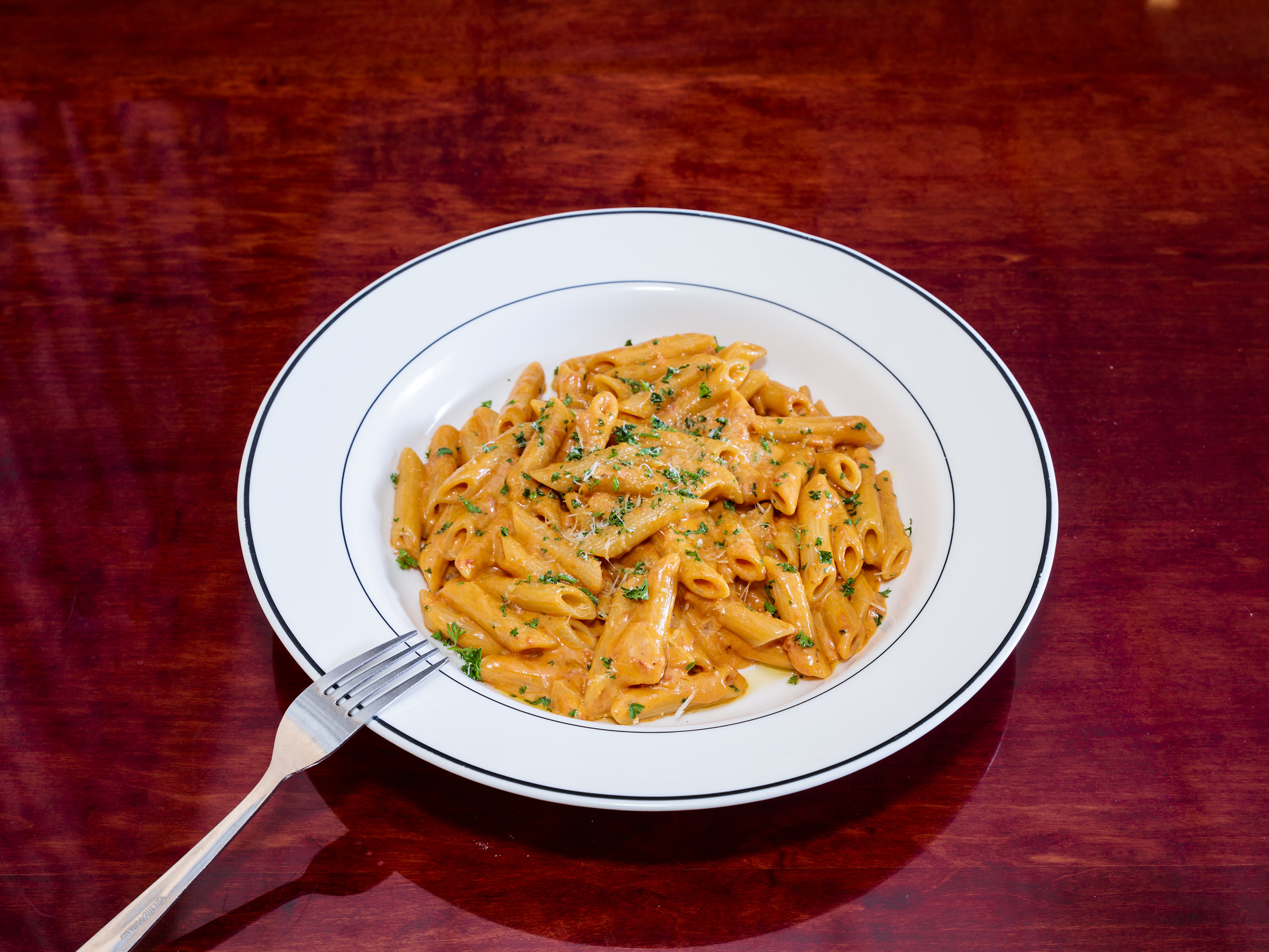 Order Penne Vodka food online from Tolli's Apizza Restaurant store, East Haven on bringmethat.com
