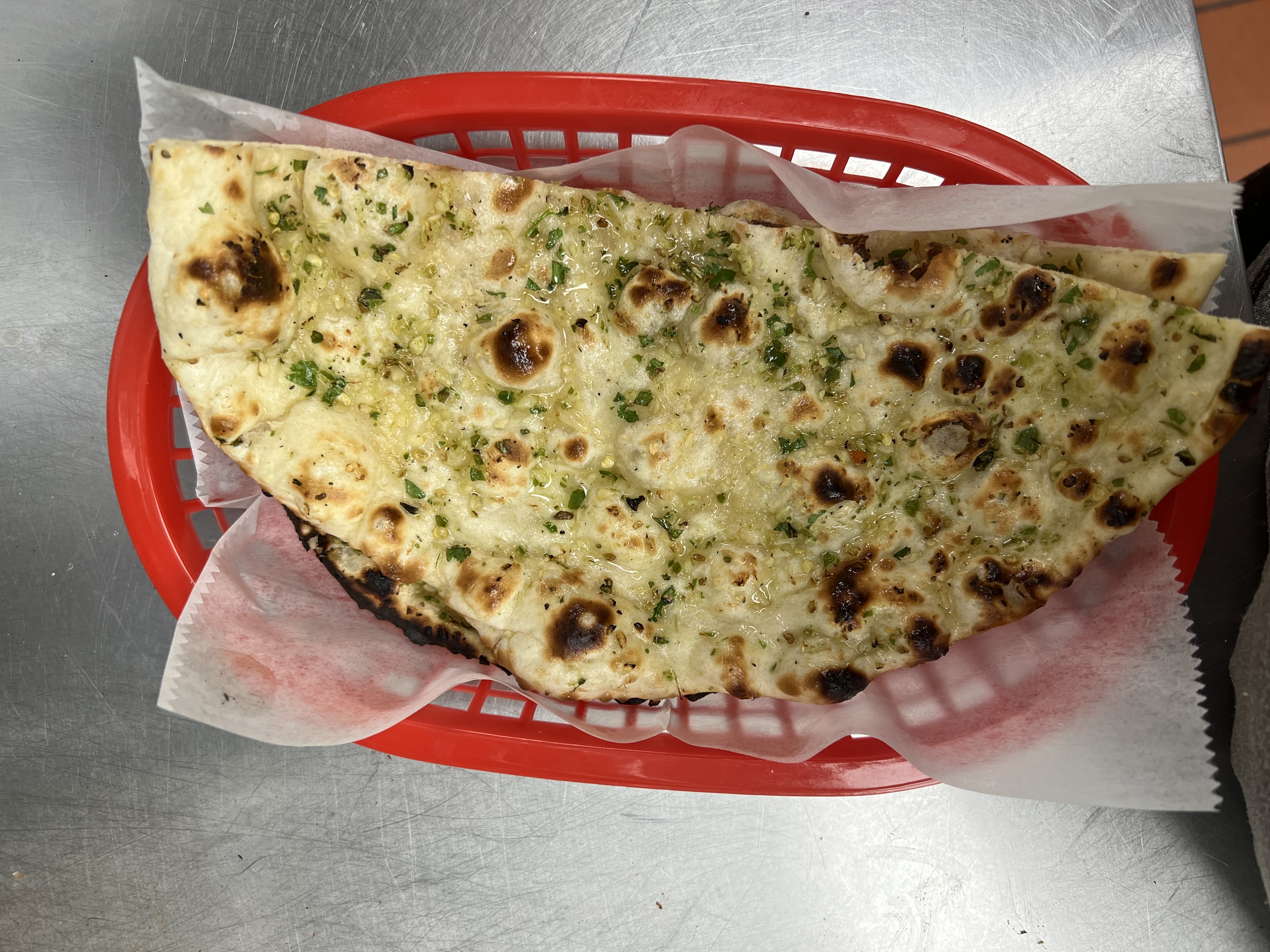Order Garlic & Chilli Naan (spicy ) food online from Saffron Patch store, Philadelphia on bringmethat.com