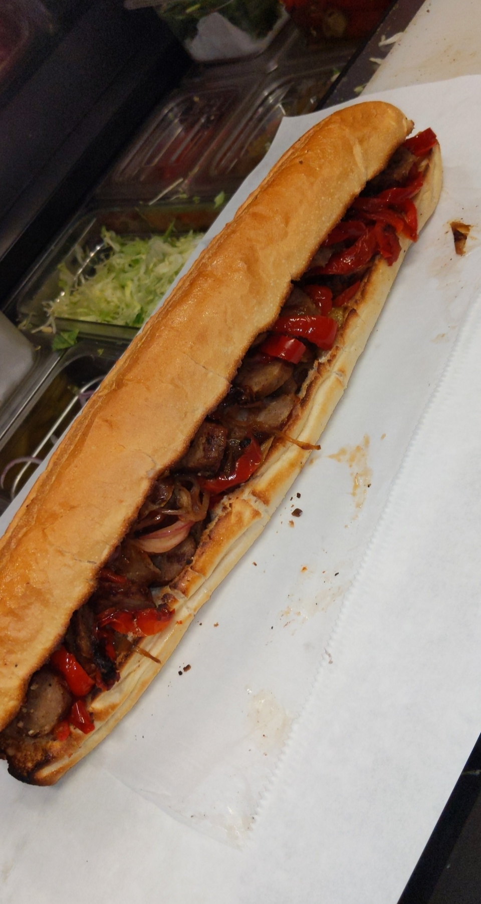 Order LG sausage peppers and onions food online from Super hero sub shop store, Jersey City on bringmethat.com