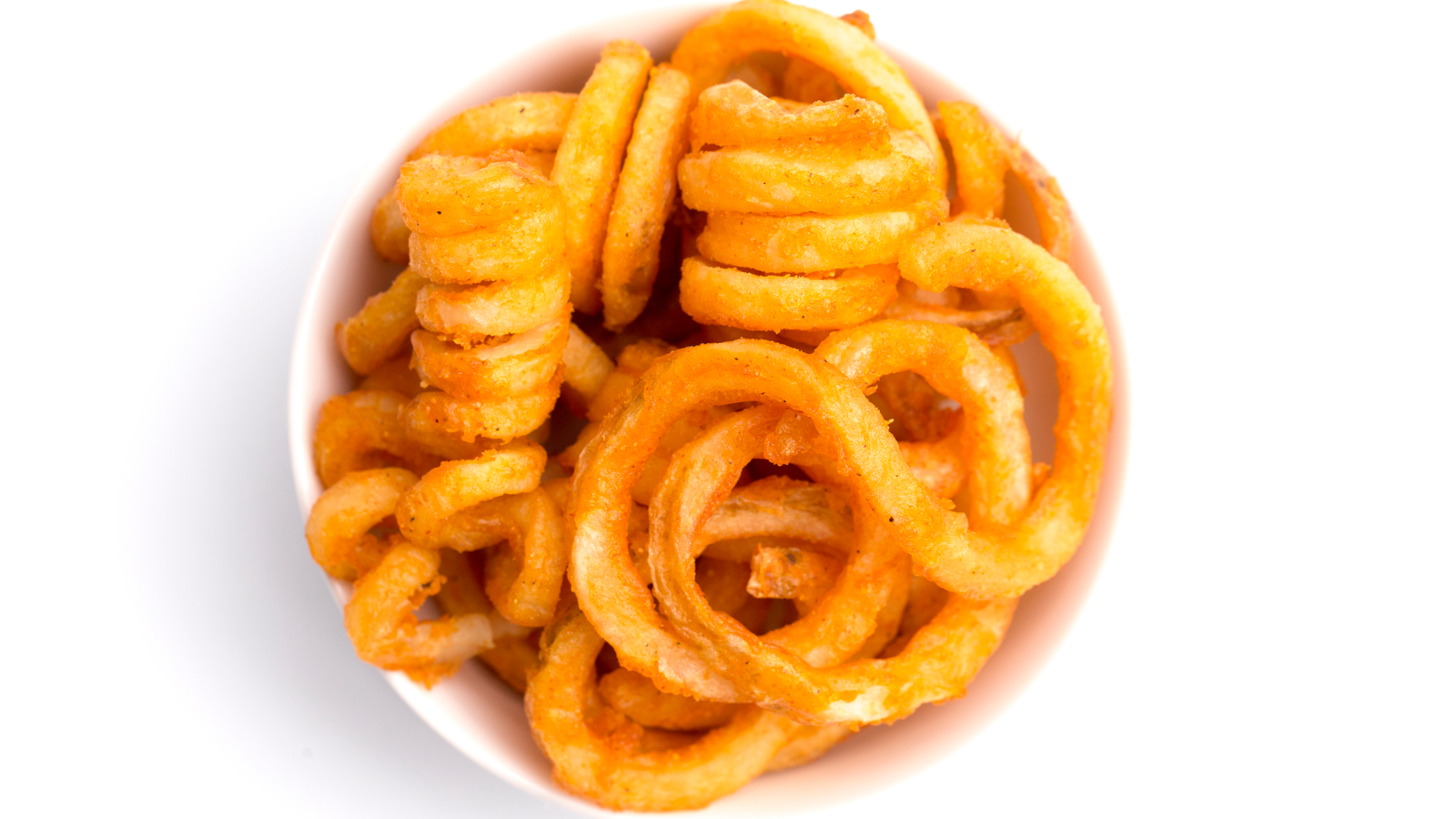Order Curly French Fries food online from The Burger Trilogy store, San Francisco on bringmethat.com