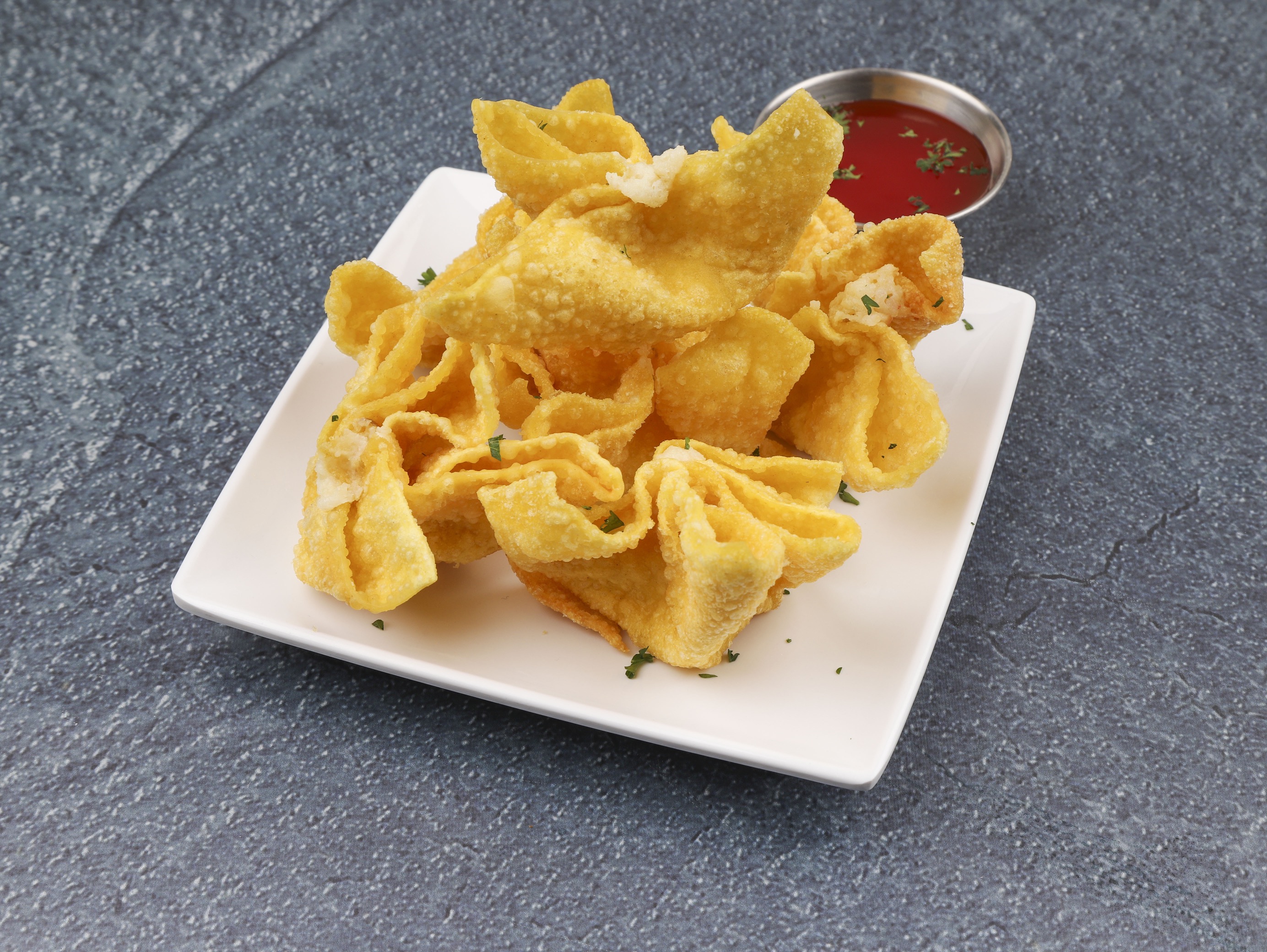 Order 6 Piece Crabmeat Rangoon food online from The Golden Coast II store, Charlotte on bringmethat.com