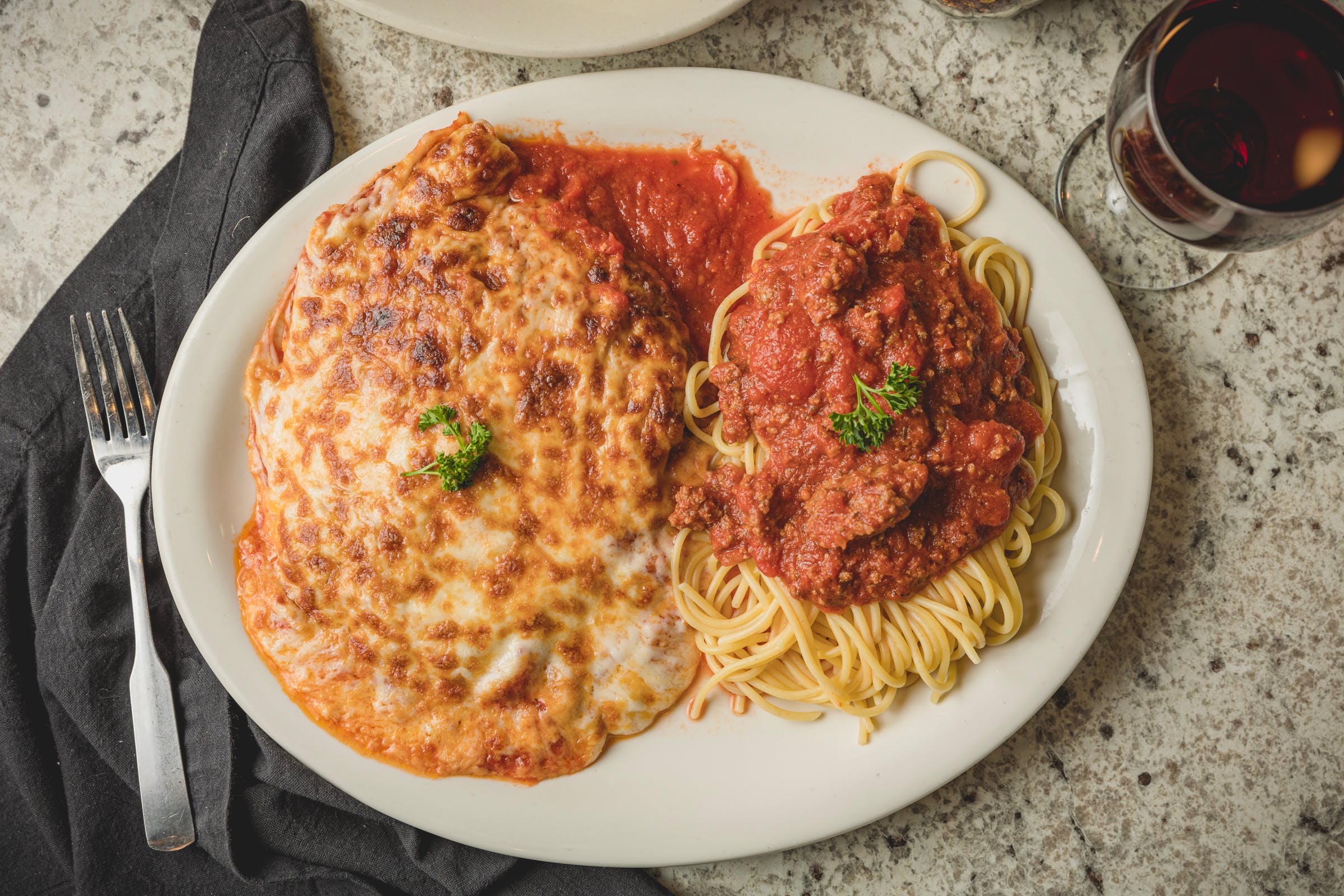 Order Veal Parmigiana - Entree food online from Mario Pizza & Pasta store, Seabrook on bringmethat.com