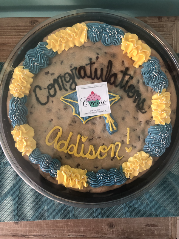 Order Graduation Cookie Cake food online from Creme By Sarah Ashley store, Orland Park on bringmethat.com