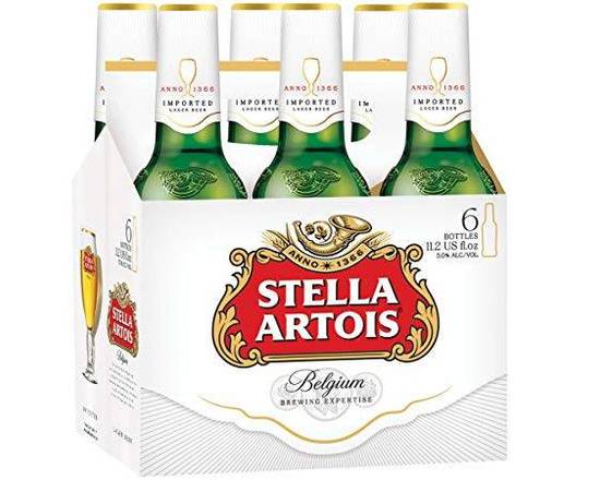 Order Stella Artois, 6pk-12oz bottle beer (5.2% ABV) food online from Tenderloin Liquor store, San Francisco on bringmethat.com