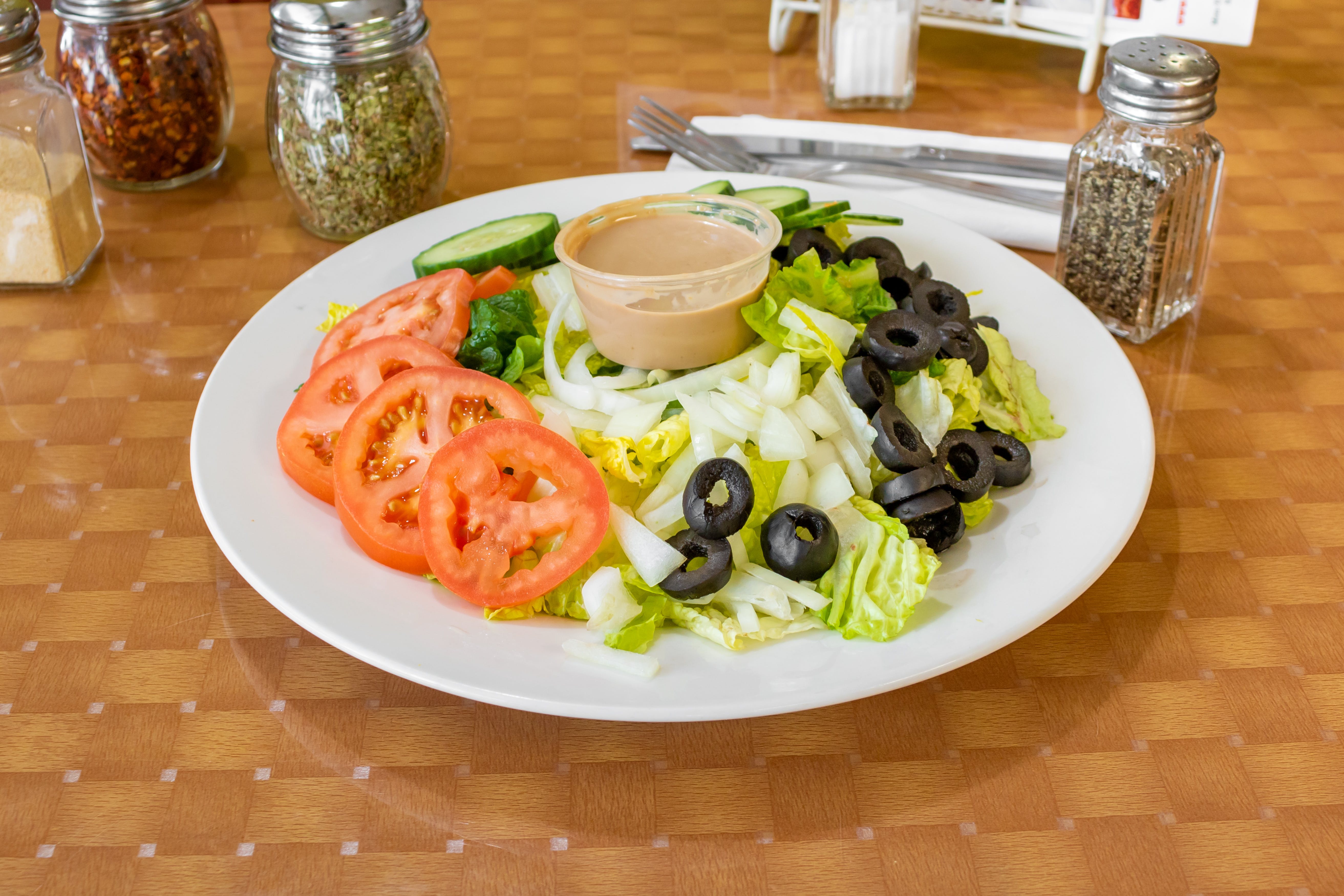 Order Garden Salad - Salad food online from Danny's Tomato Pie store, Ewing on bringmethat.com