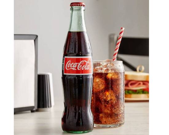 Order Mexican Coke food online from Chopsticks Cuisine store, Seattle on bringmethat.com
