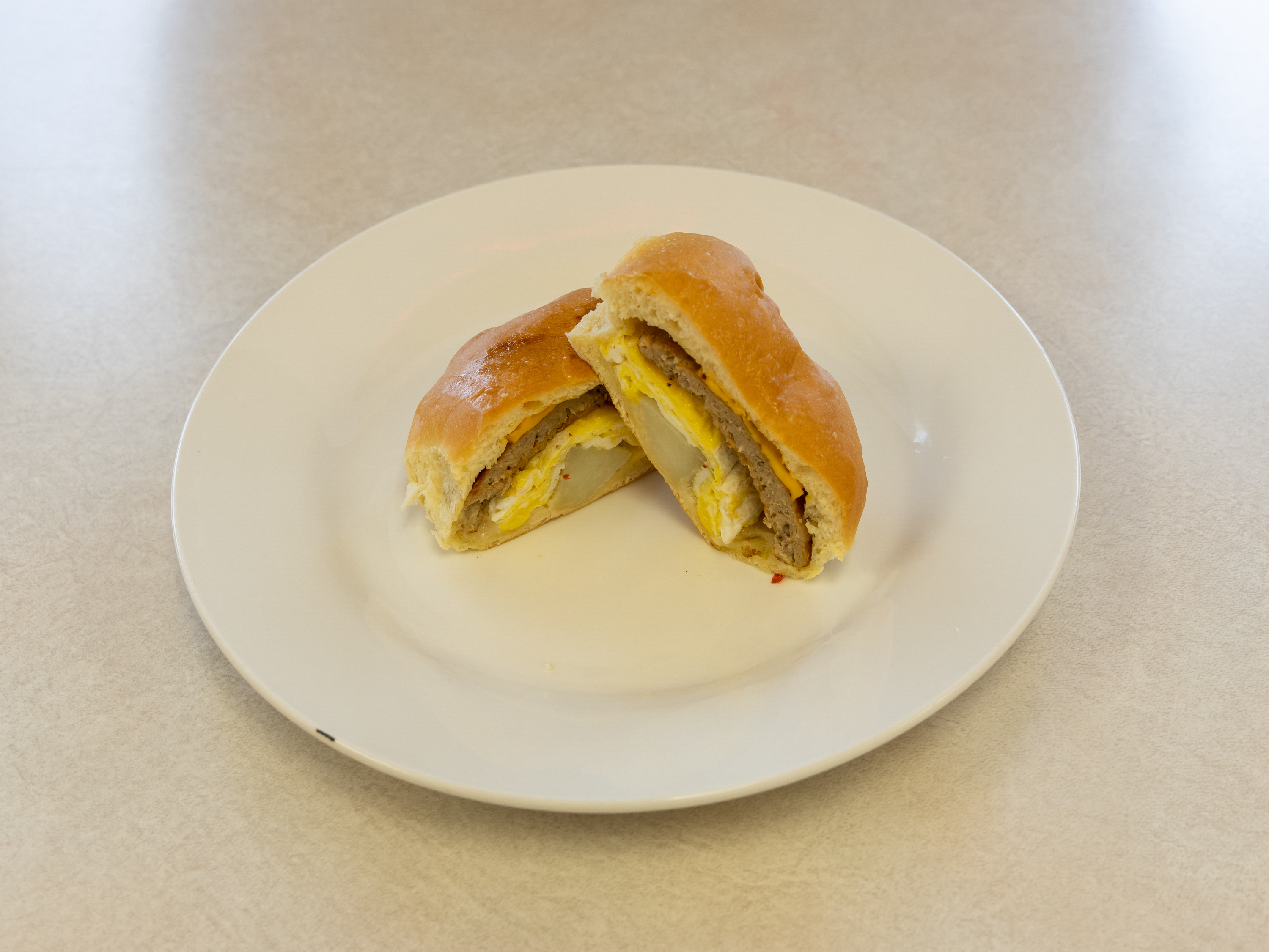 Order Special Sausage Egg and Cheese Potato Kolache food online from Mr. Donut And Kolache store, Jersey Village on bringmethat.com