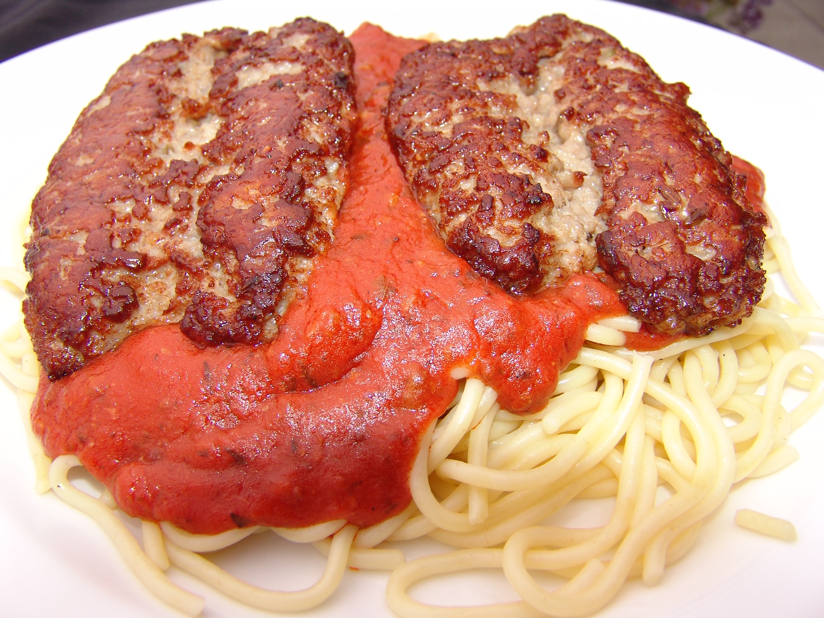Order 17. Italian Sausage with Spaghetti food online from Little Henry's store, San Francisco on bringmethat.com