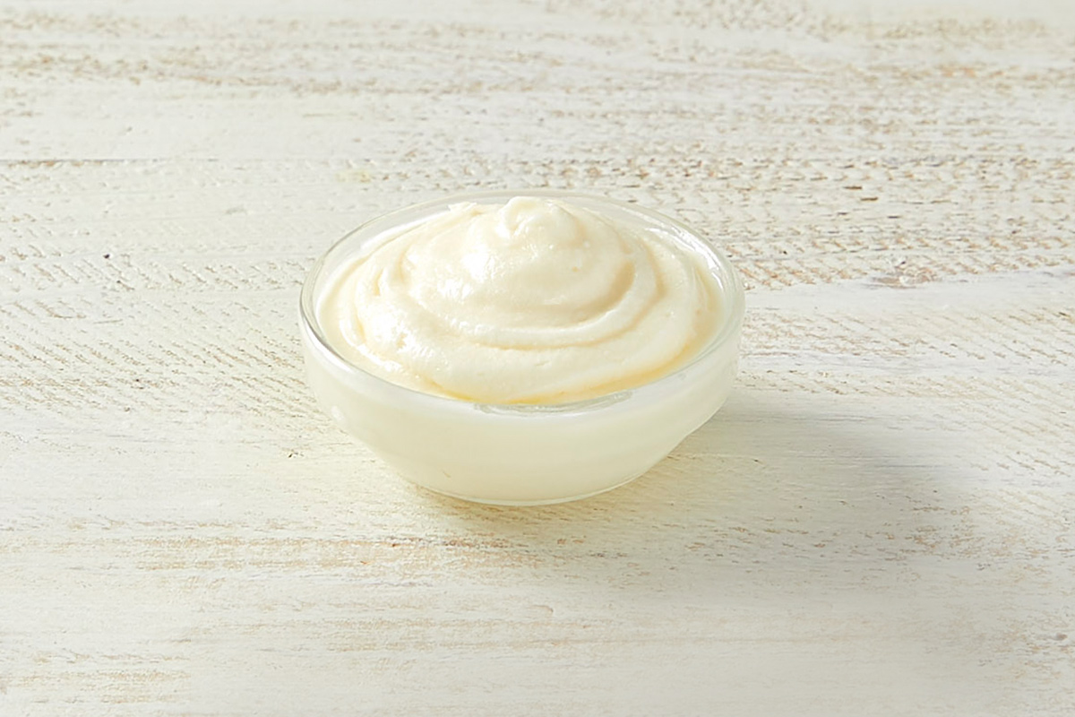 Order Side of Cream Cheese Frosting food online from Cinnabon store, Baltimore on bringmethat.com