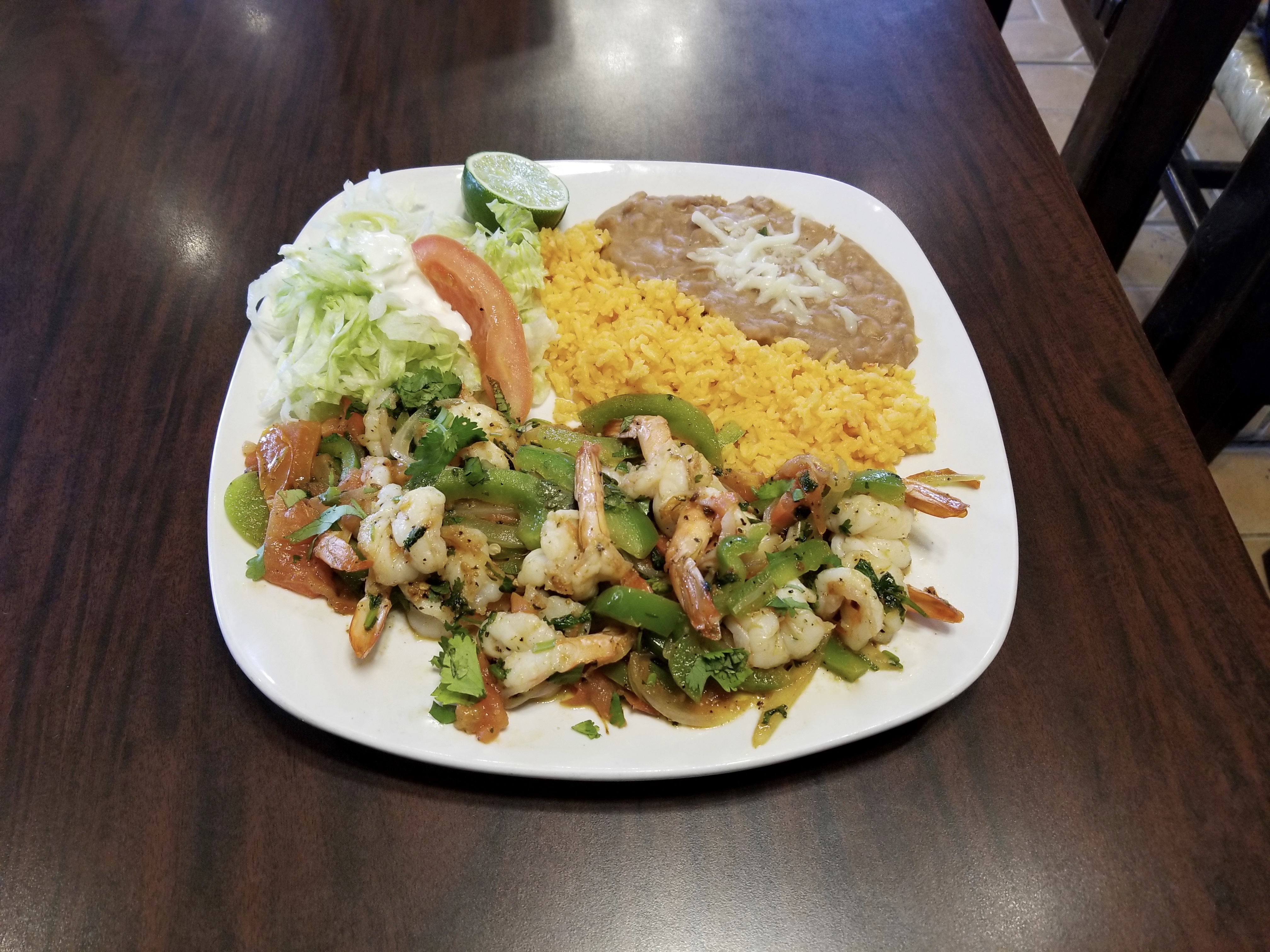Order Shrimp Fajitas food online from Martinez Tacos Restaurant store, Kankakee on bringmethat.com